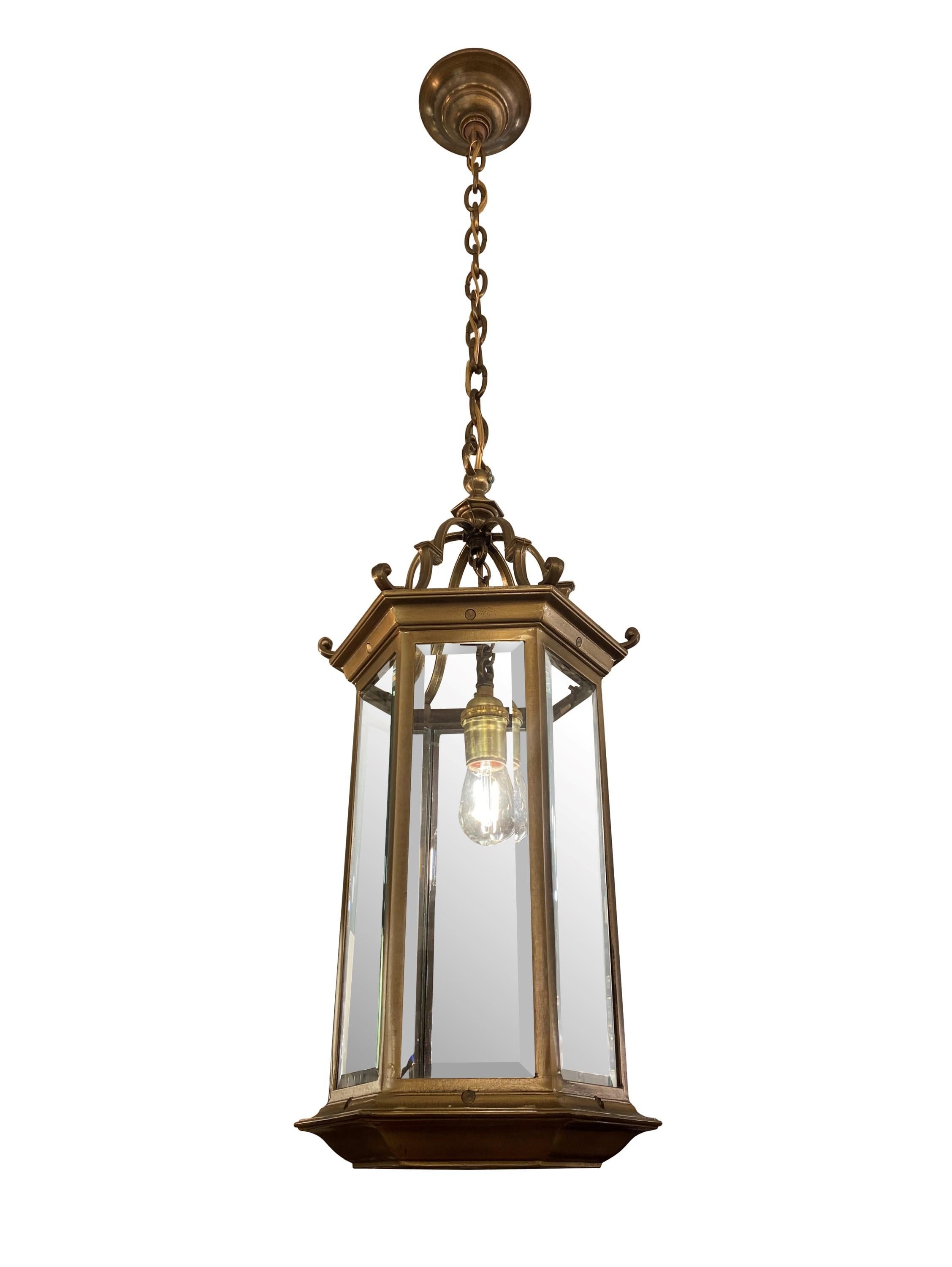 20th century hexagon design bronze foyer lantern featuring six beveled glass panes. Cleaned and restored. Please note, this item is located in one of our NYC locations.