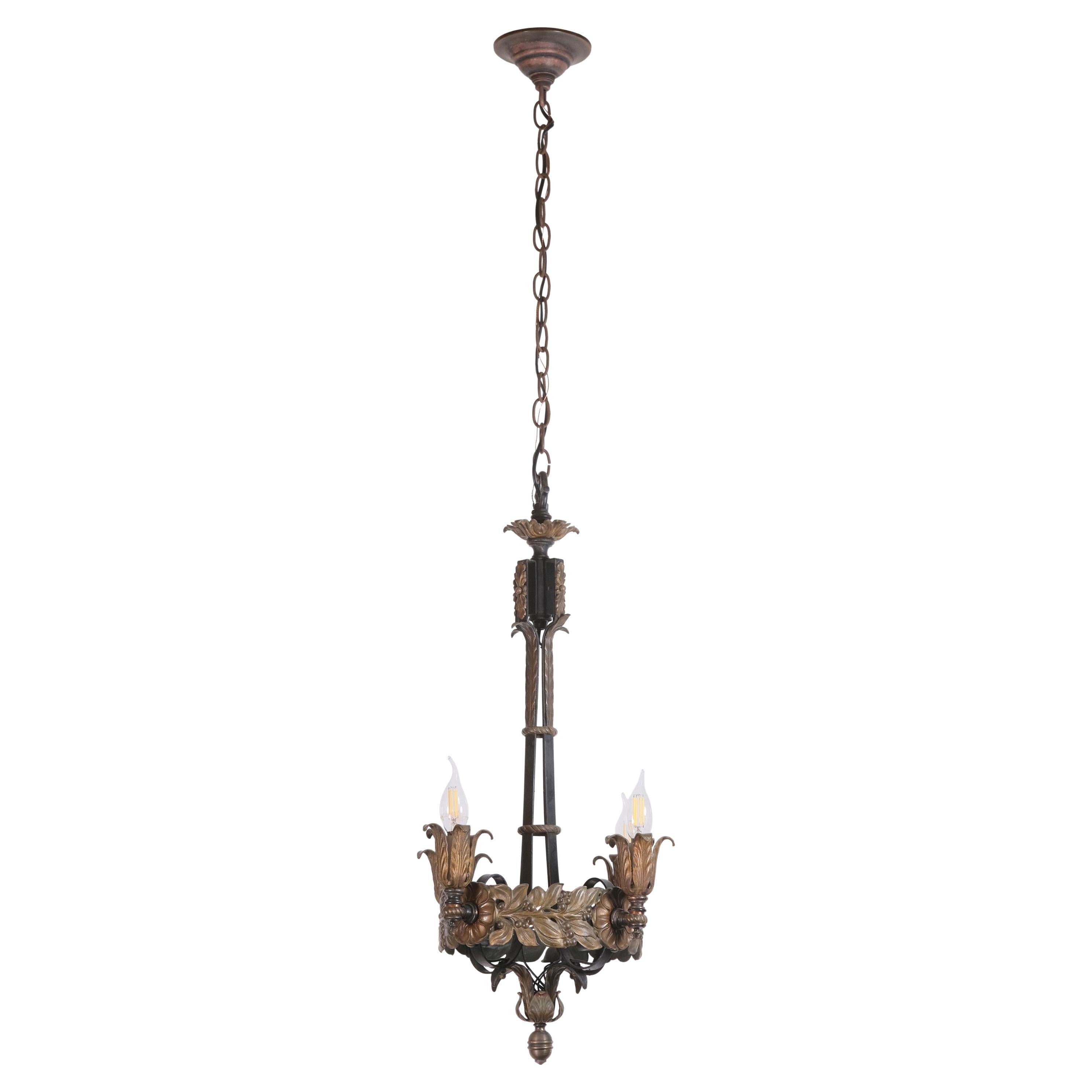 Italian Cast and Hammered Iron Chandelier For Sale at 1stDibs
