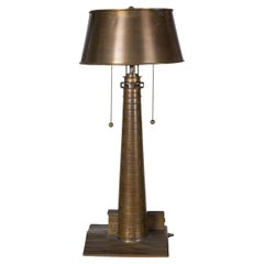 Lampe de table phare en bronze coulé