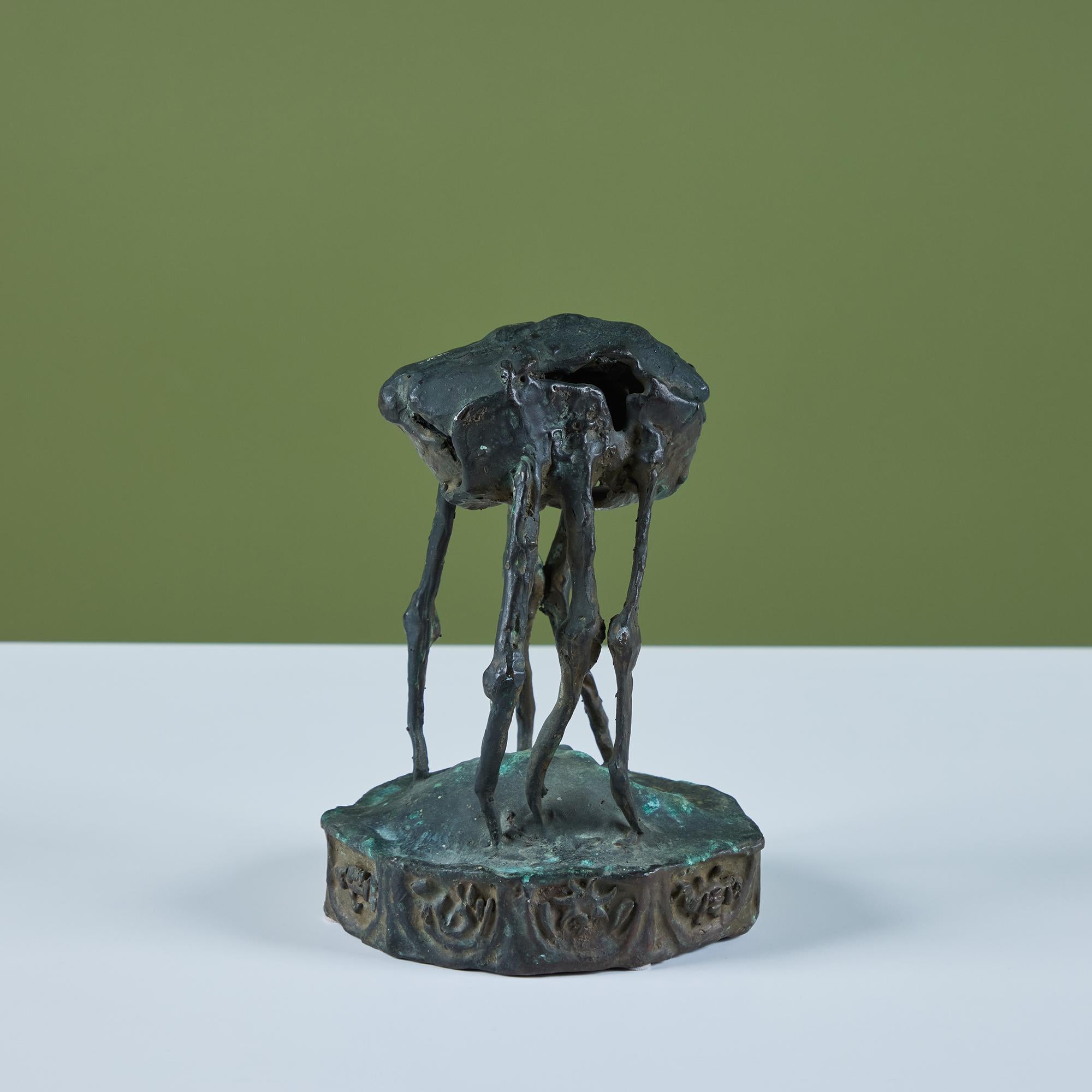 Cast bronze 'Sand Flea' sculpture by American sculptor J. Dale M'Hall. James began sculpting in the 1960's and has worked with a variety of different media throughout his career but bronze sculpting is his preferred medium which expresses and