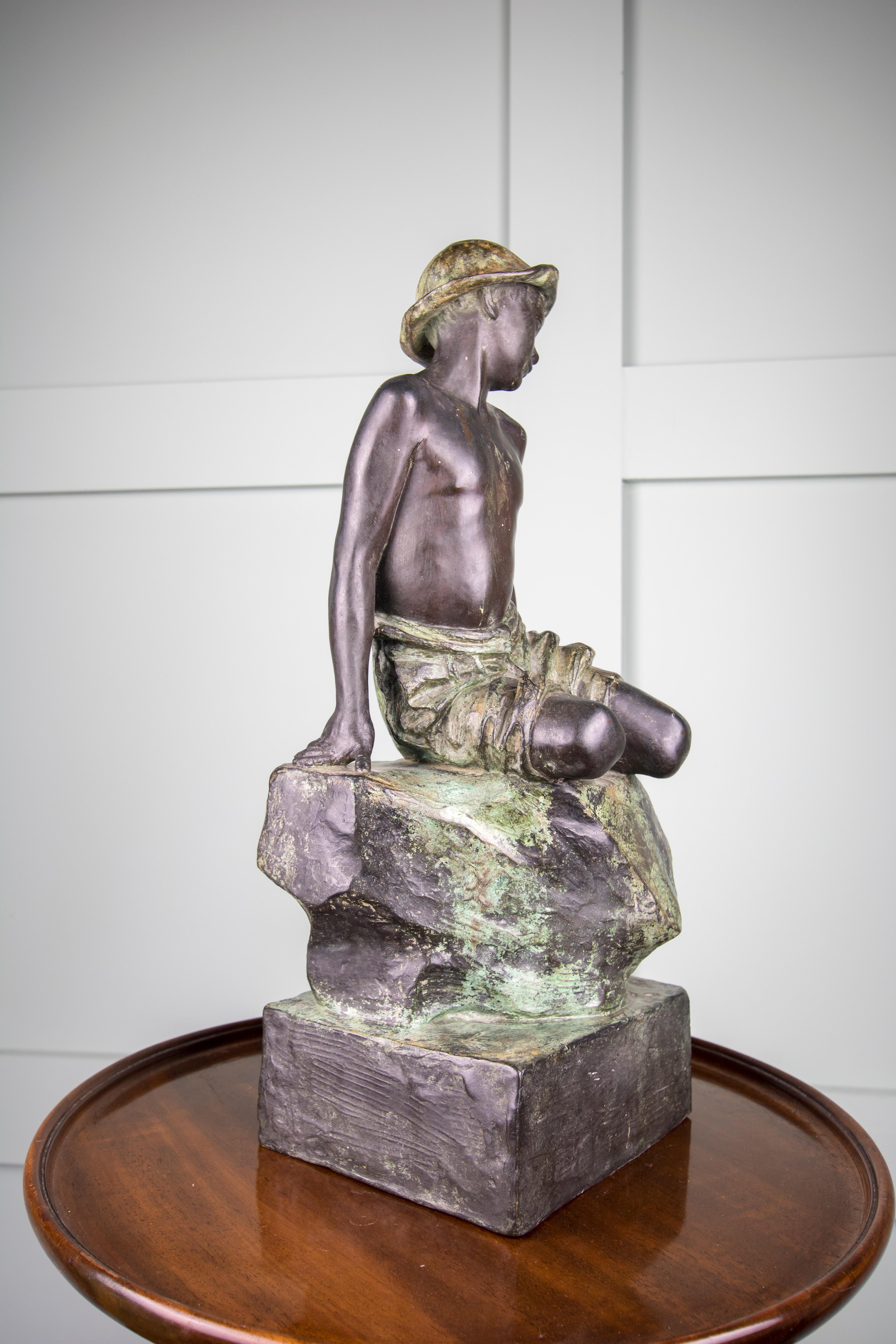Edwardian Cast Bronze Sculpture of a Boy Sitting on a Rock, 1919, Rome For Sale