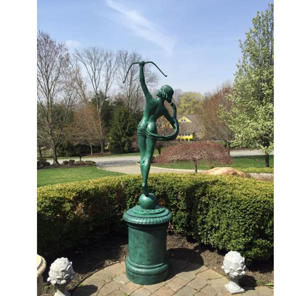 A contemporary cast bronze sculpture depicting Diana, goddess of the hunt, moon and animals in verde bronze patina. This piece is available in different patinas – bronze, antique verde, Italian verde. Also known as Artemis in Greek mythology, Diana