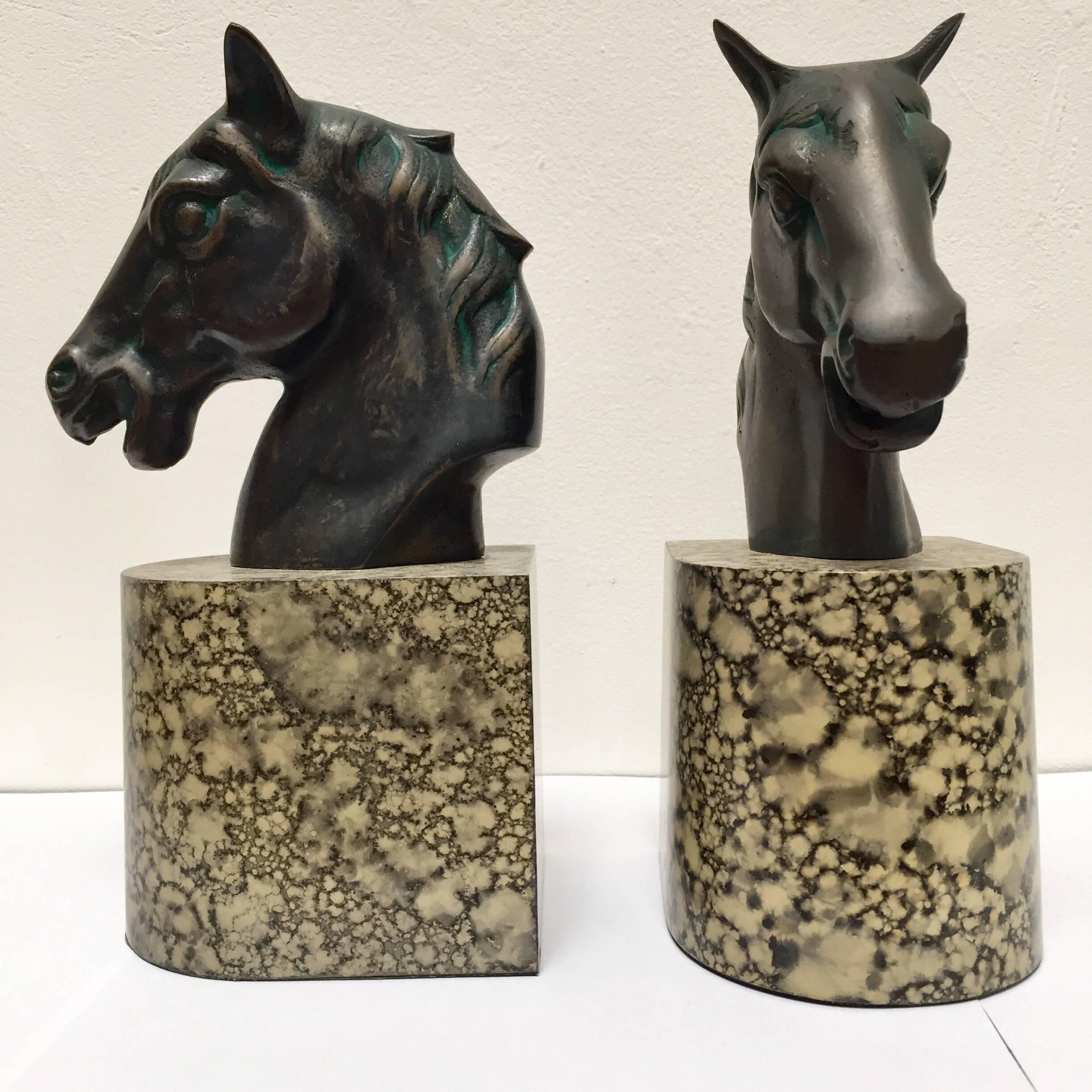 Cast bronze black horse bust sculptures bookends, great to use on a desk as a paper weight or decorative object around the house or office.
Equestrian Gucci style horse bust on stand in faux marble.
Measure each: 4