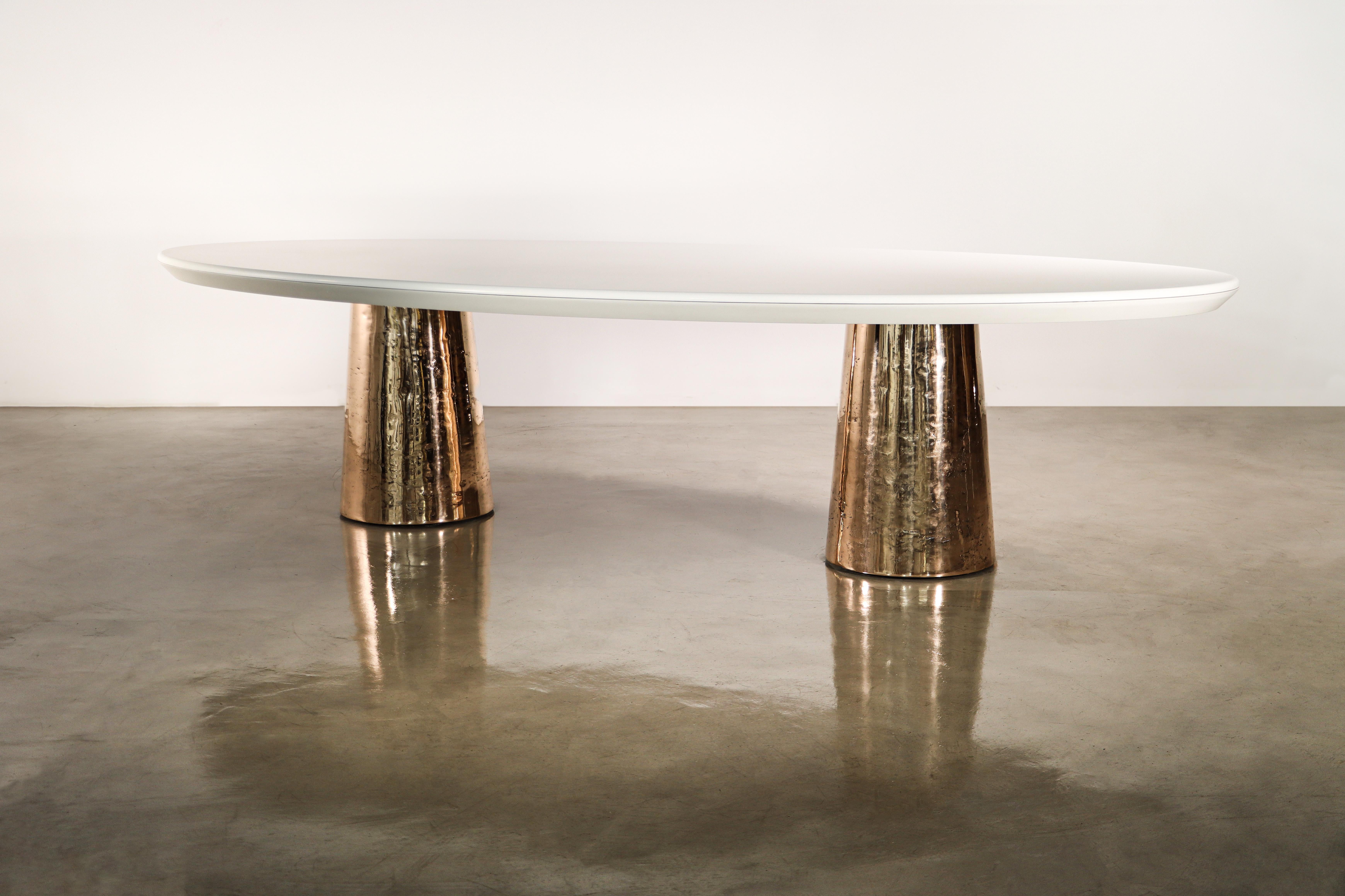Benone cast bronze stone & wood twin pedestal oval dining table from Costantini

Measurements are 132