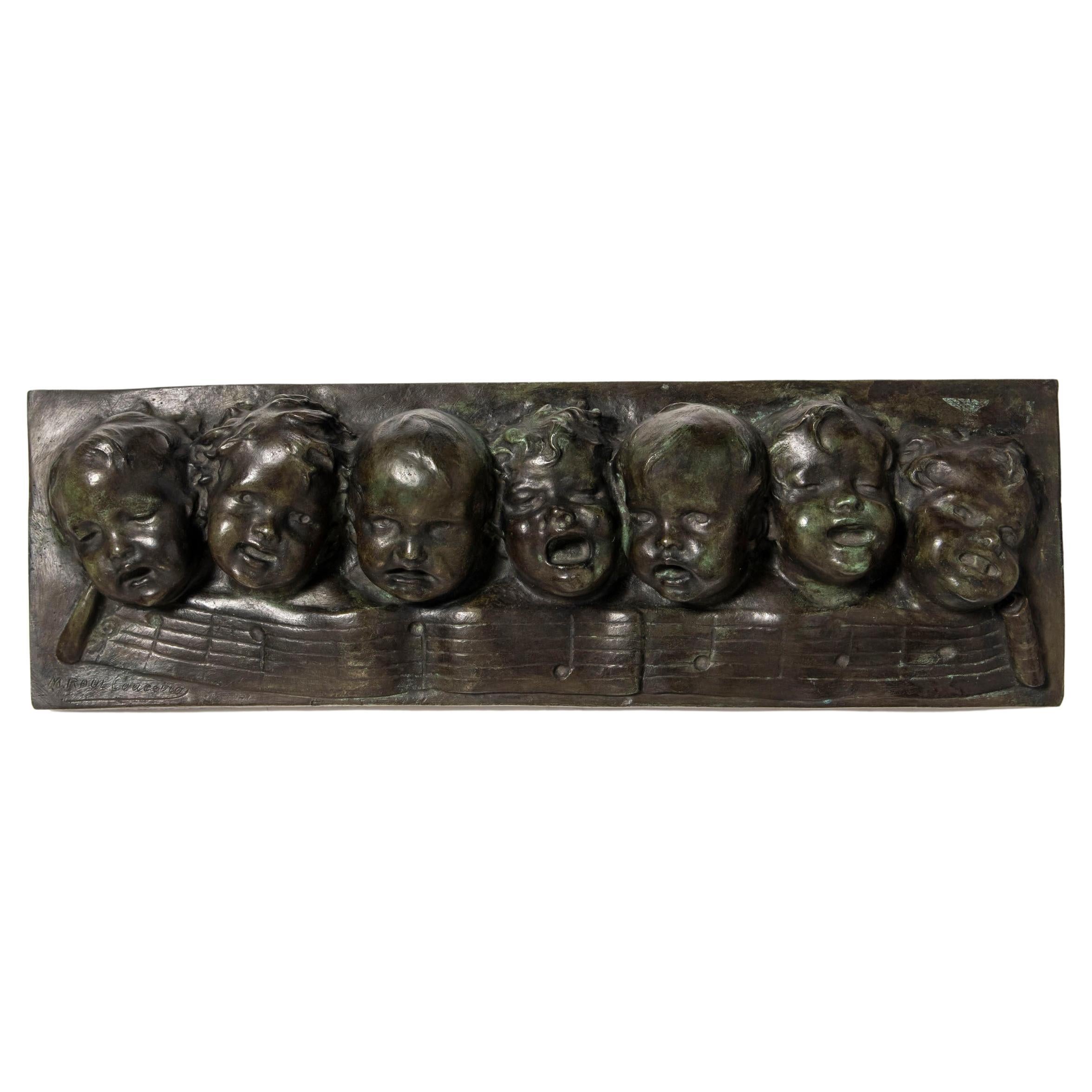 Cast Bronze Wall Sculpture with Seven Children Chorus.Europe, Early 20th Century For Sale