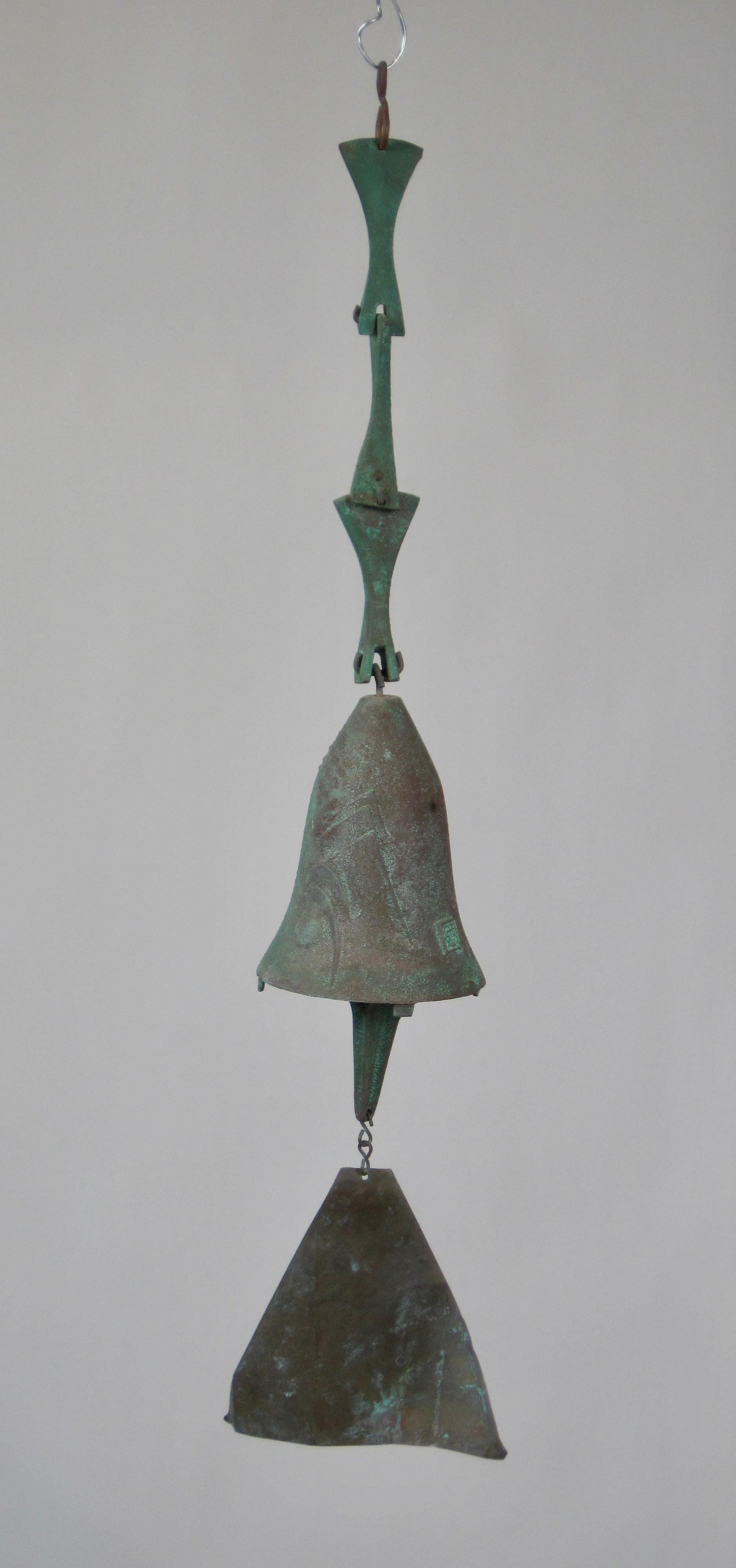 Cast bronze sculptural wind bell with great patina by artist, architect and visionary, Paolo Soleri. This piece was made at his Cosanti studio in Arizona by the artist who originally came to the US in 1947 to study under Frank Lloyd Wright. The