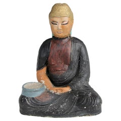 Escultura de Buda de cemento fundido con pintura vieja