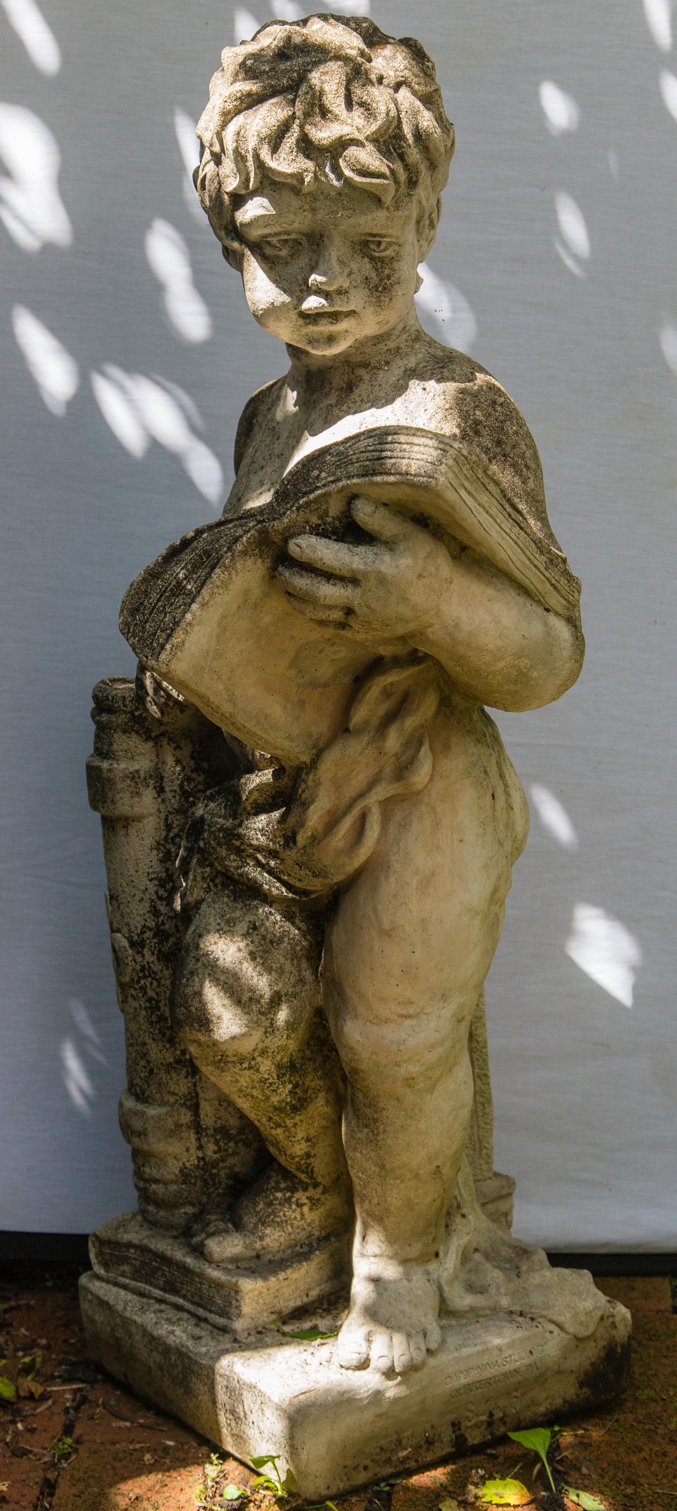 20th Century Cast Cement Figure of a Cherub For Sale