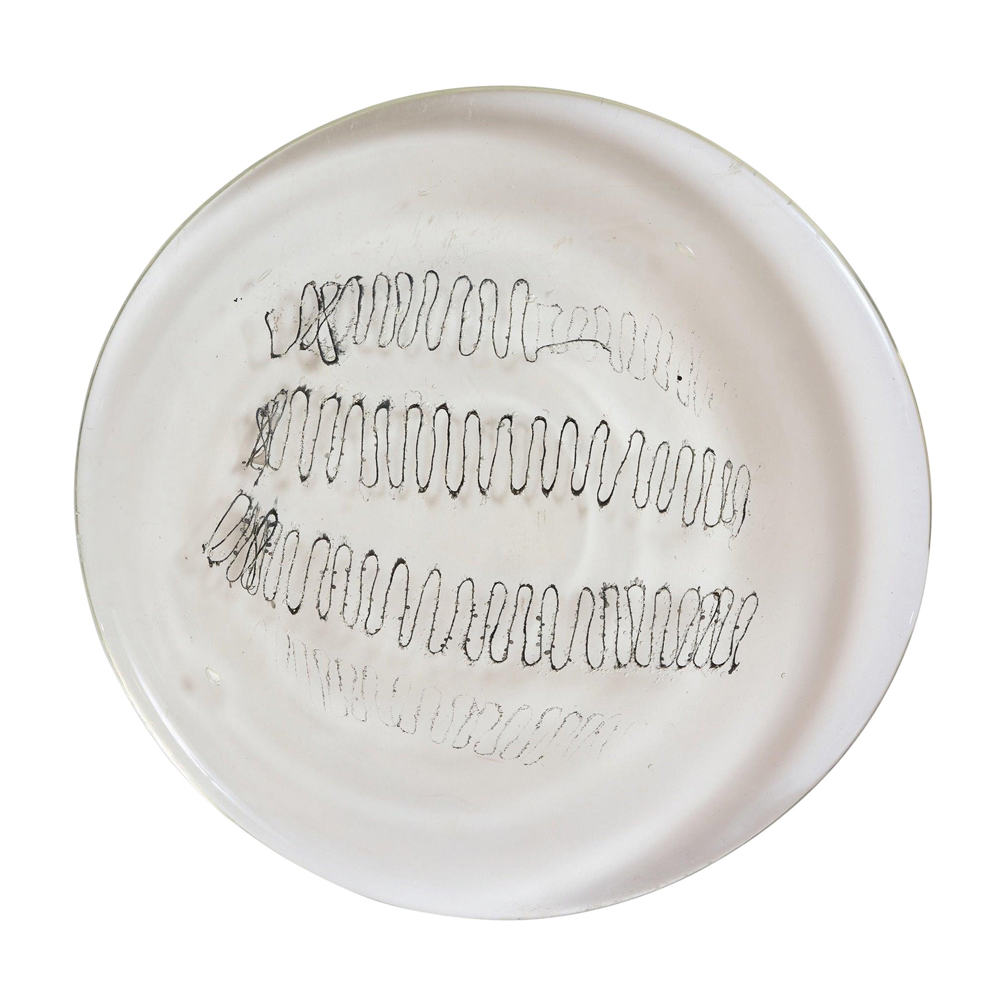 Plat en verre moulé