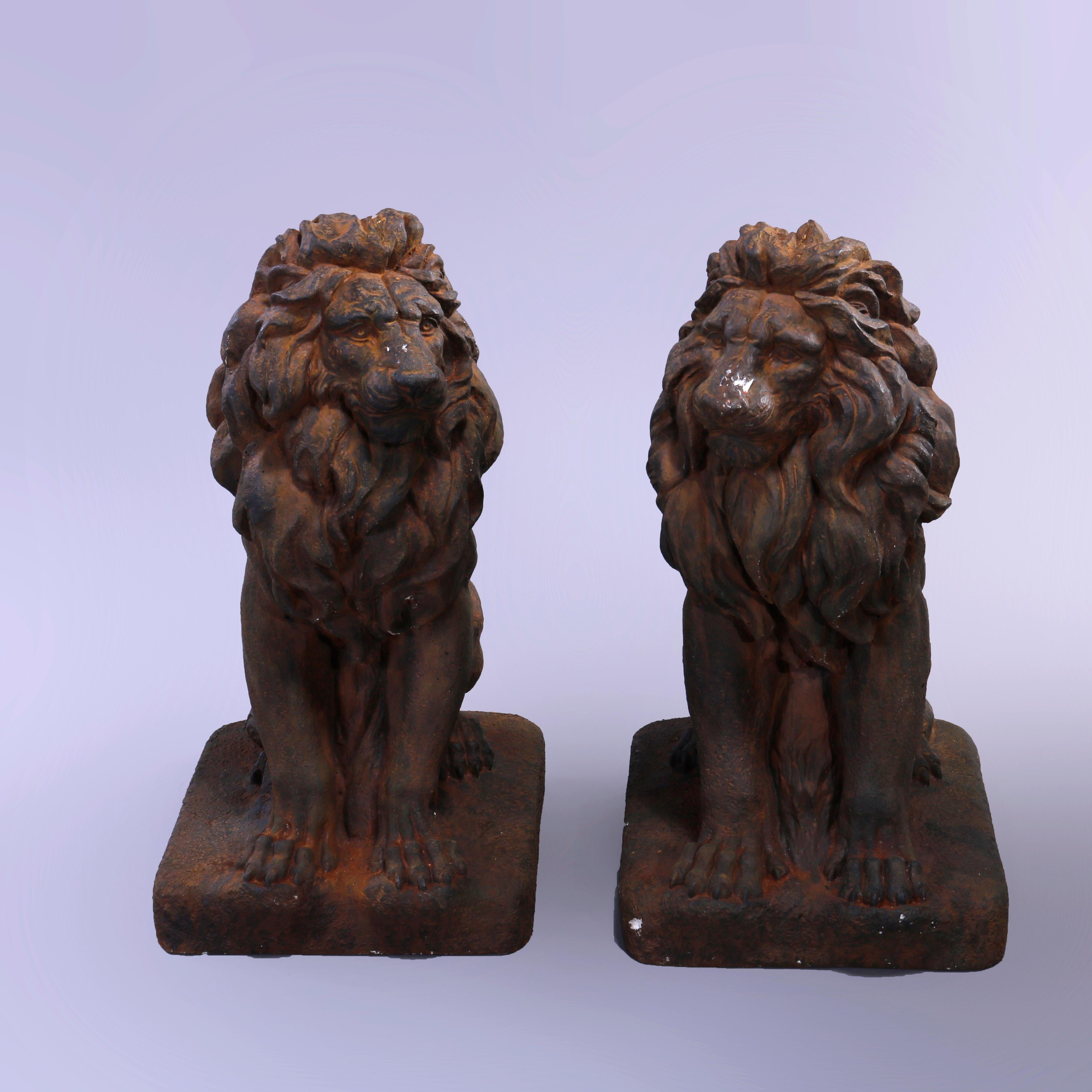 A pair of figural garden sculptures offer bronzed cast hard stone classical lions in the seated position, 20th century.

Measures- 22.5''H x 10''W x 14''D.