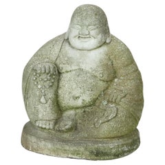 Buda querúbico de piedra dura fundida S. XX