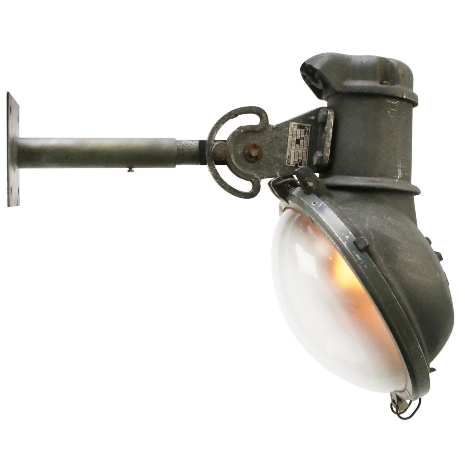 Industrial wall light by Crouse Hinds,Toronto, Canada
Cast aluminum, cast iron and frosted glass.

Not suitable anymore for full rain and snow.

Foot size : 12 × 12 cm

Weight: 6.40 kg / 14.1 lb

Priced per individual item. All lamps have been made
