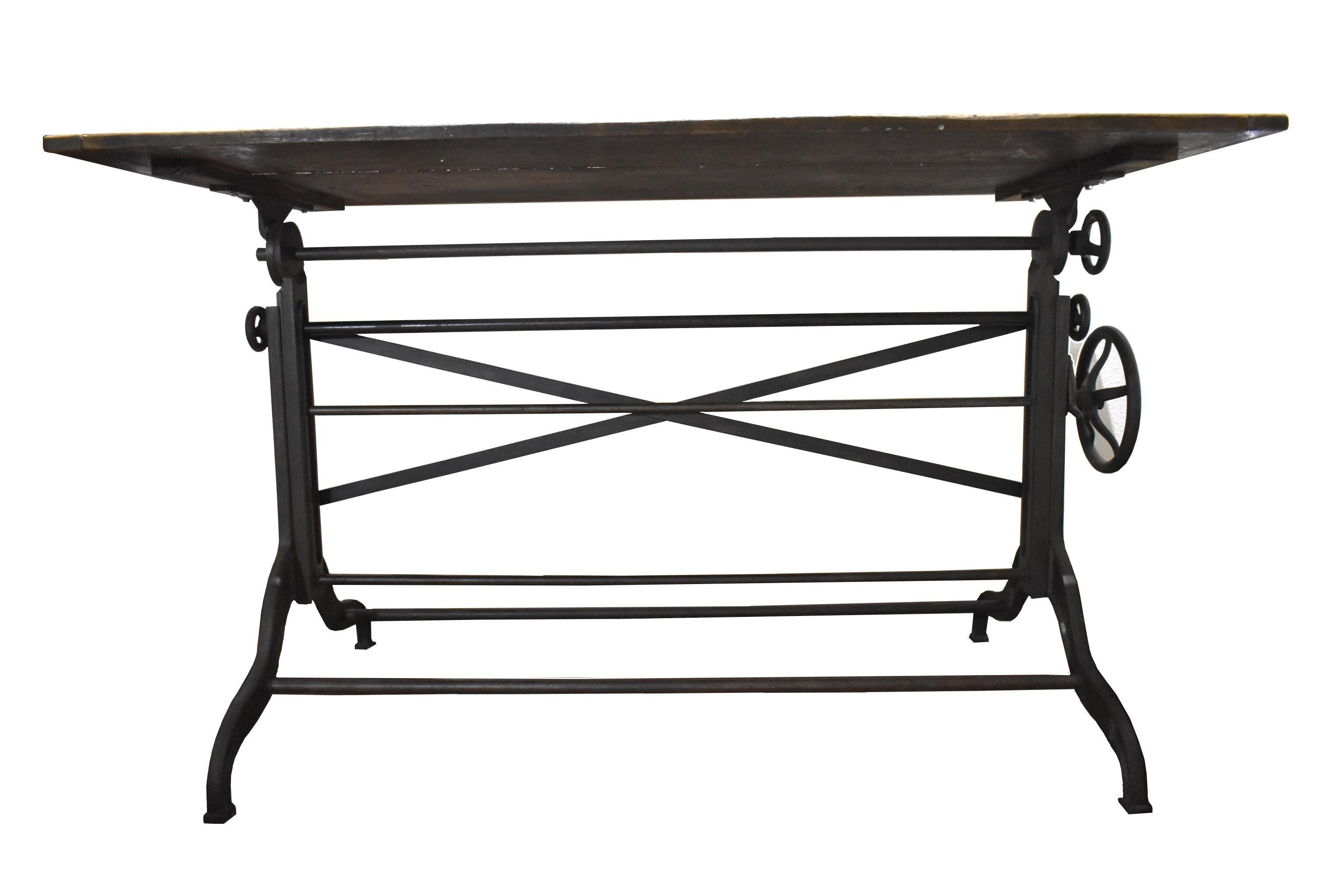 Adjustable height drafting table made in the United States in the 1920s using cast iron. This is the original standing desk! It is amazing to me how every few years we think we came out with this great new idea and then, when we look at our past we