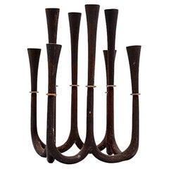 Kerzenhalter aus Gusseisen und Messing von Jens Quistgaard für Dansk Designs, 1960er Jahre