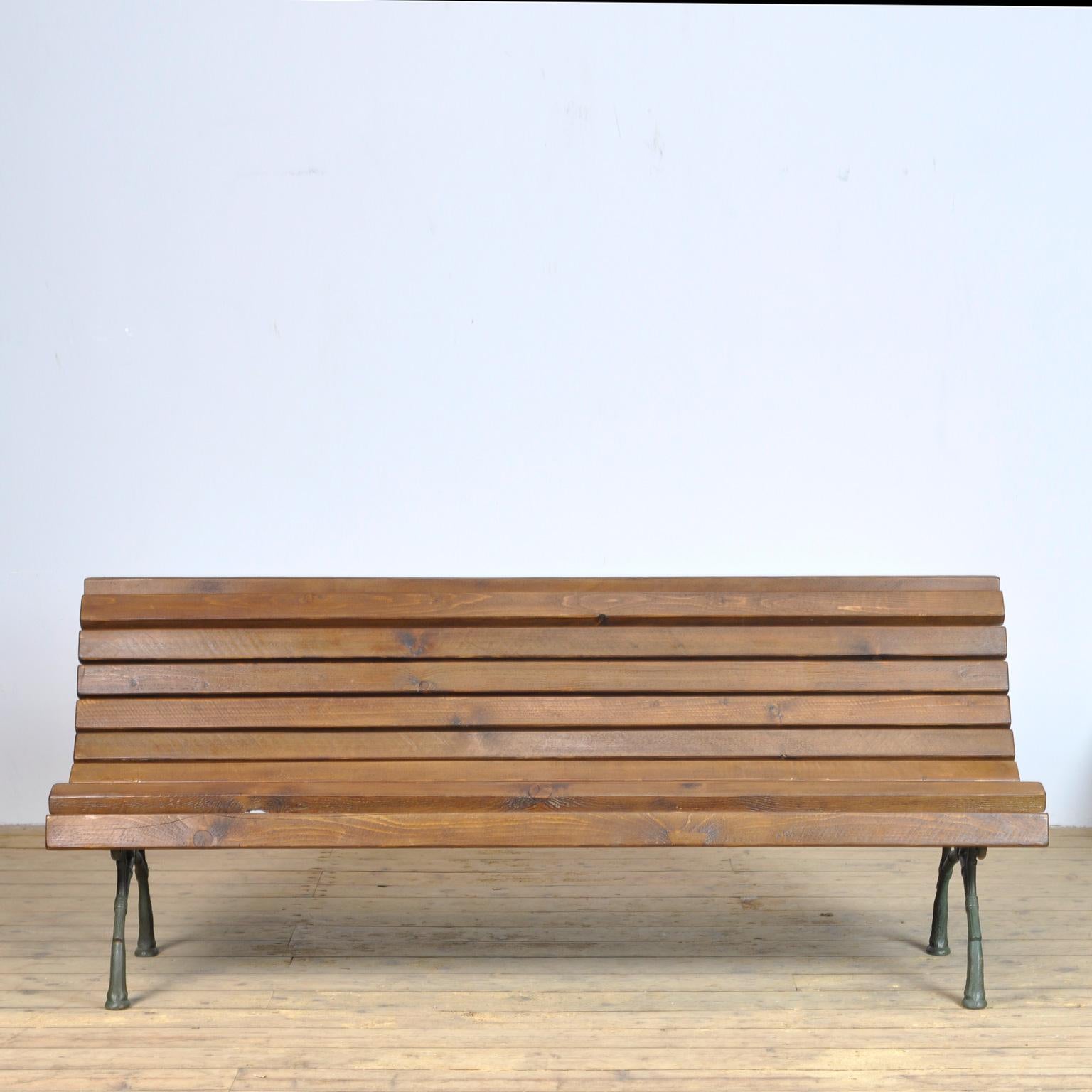 Garden Bench in pine and cast iron base, Circa 1940's.