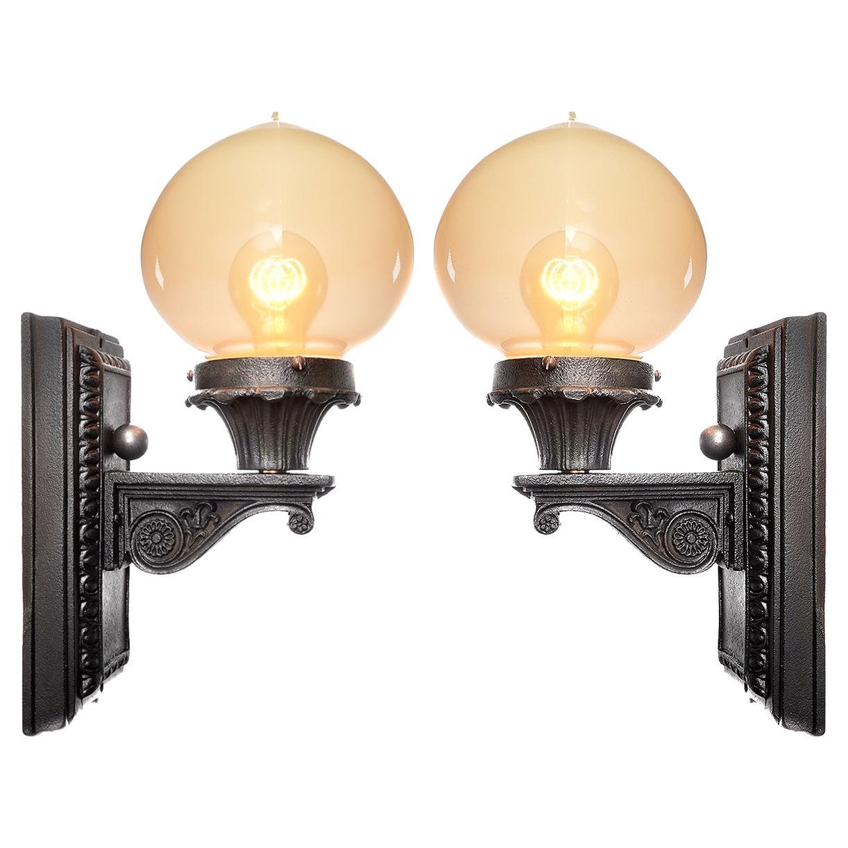 Cast Iron and Vaseline Glass Sconces For Sale