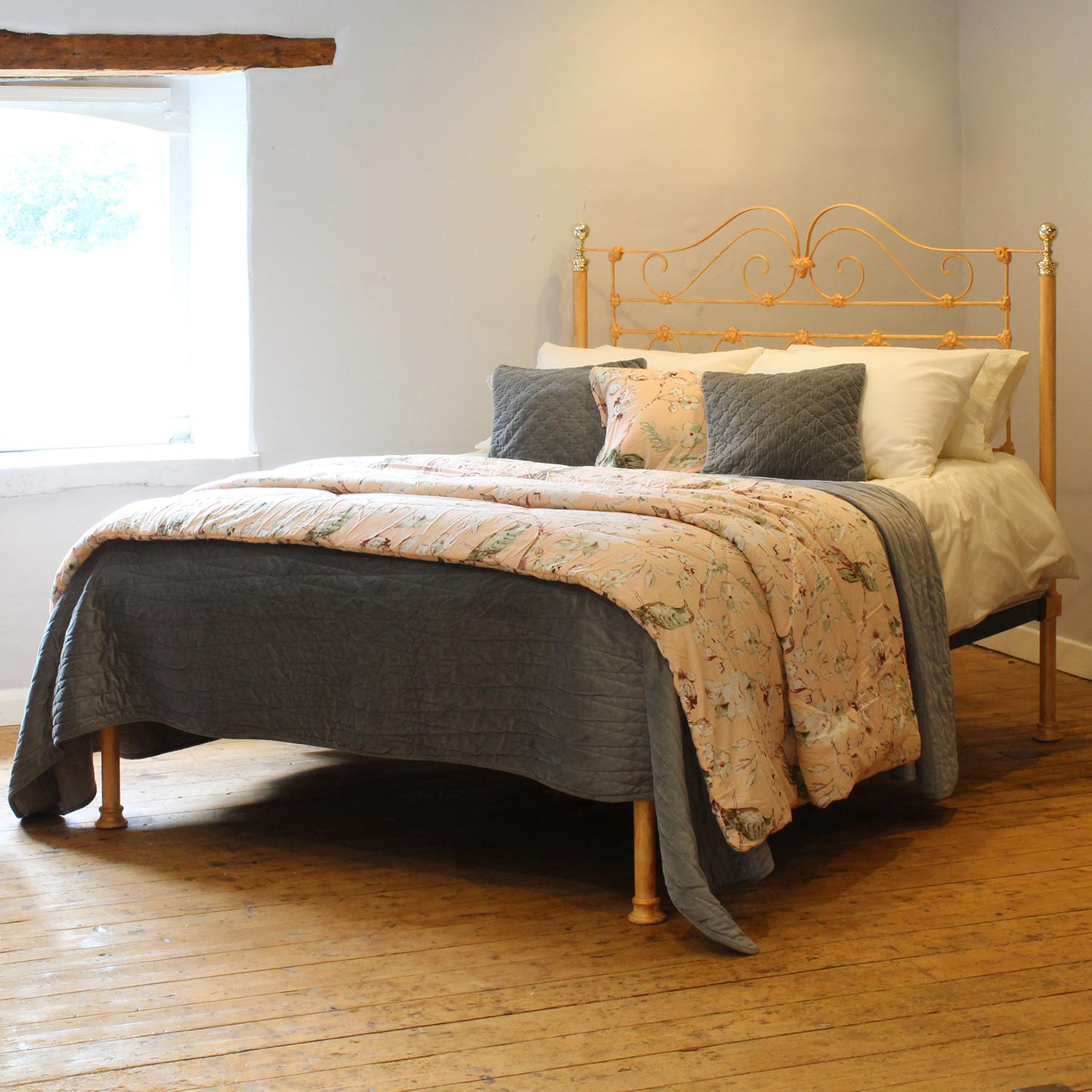A fine cast iron antique platform bed with attractive castings finished in our new hand paint finish 