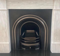 Cast iron arched fireplace insert