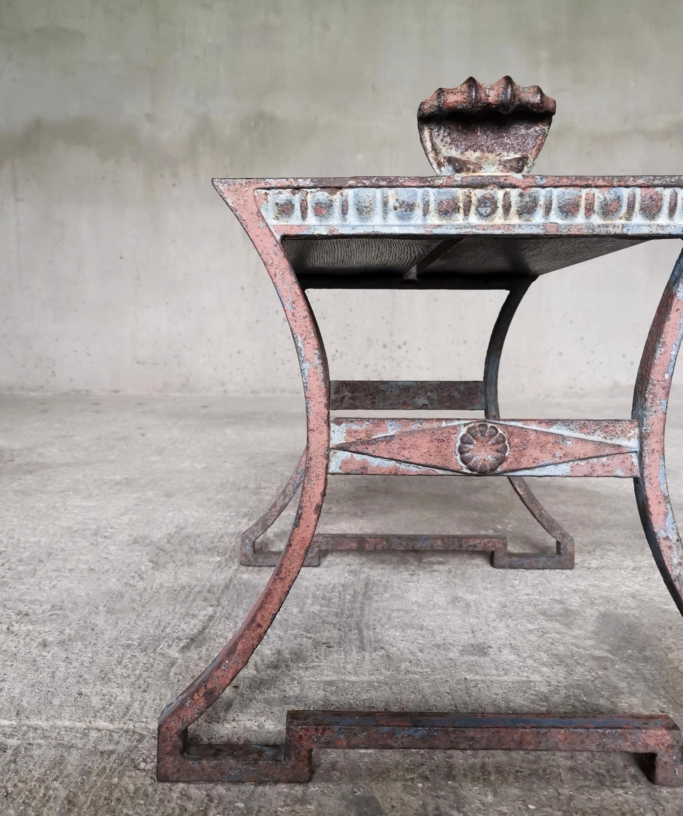 Early 20th Century Folke Bensow cast iron and solid oak bench for Näfverkvarns Bruk Sweden 1920s For Sale