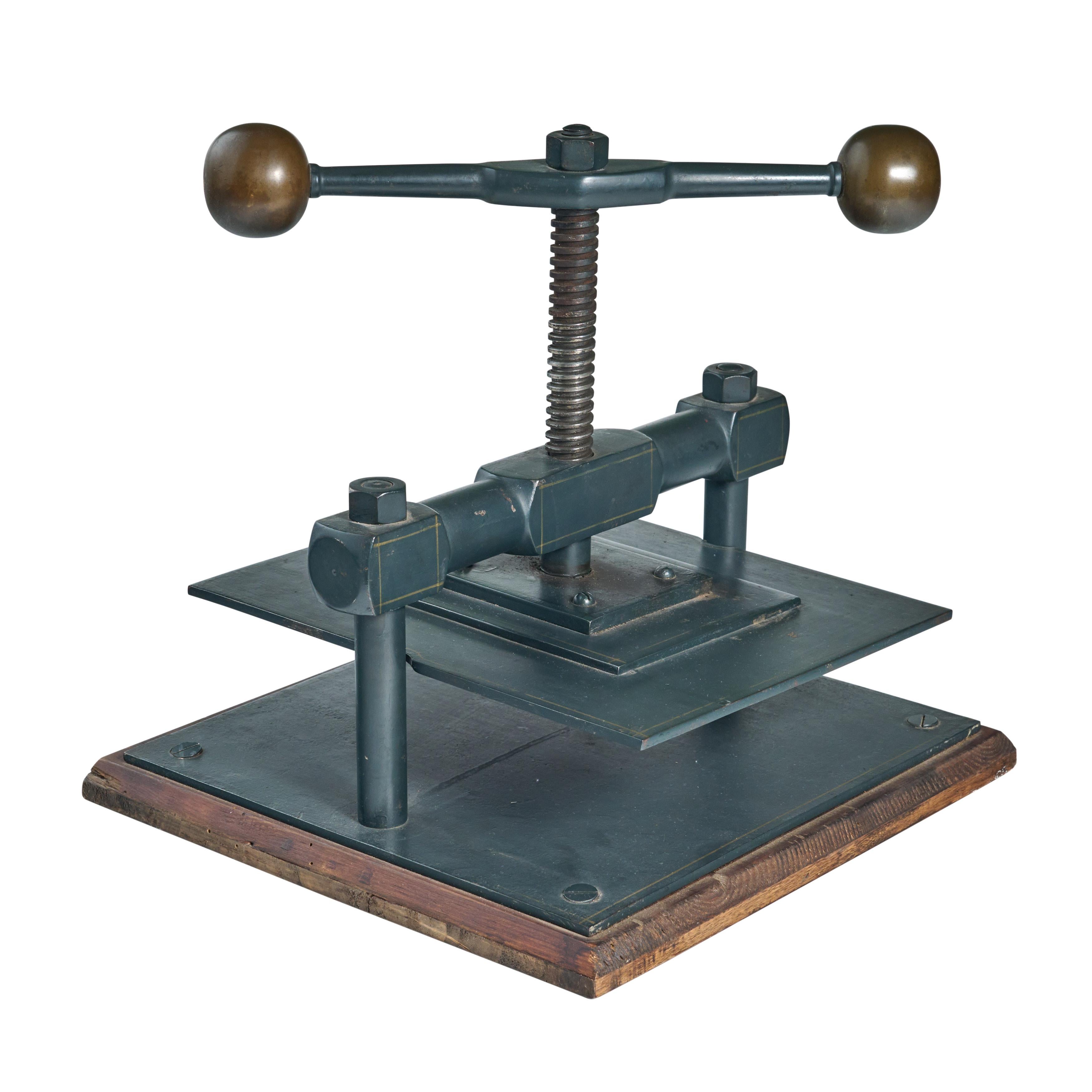 brass iron press