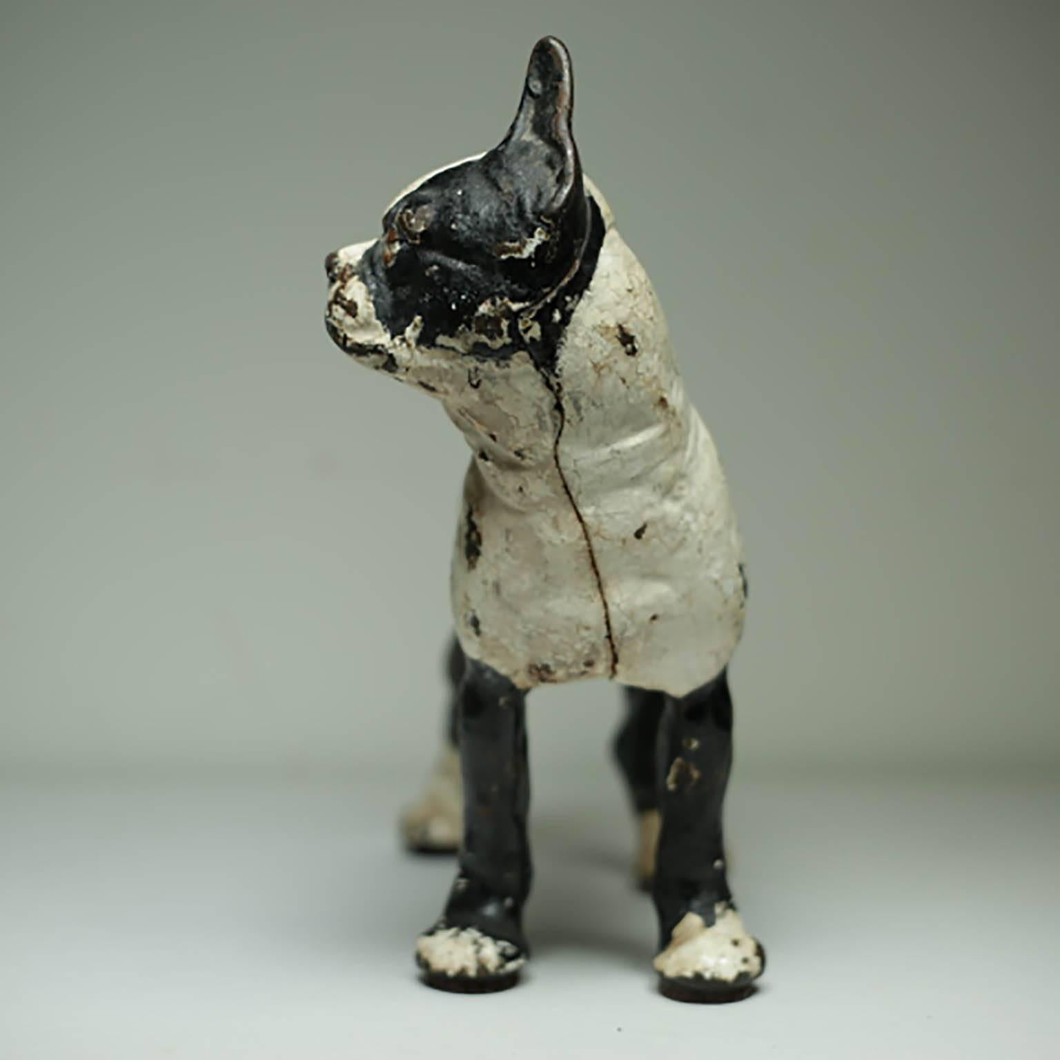 ABOUT

This is an original cast iron Boston Terrier doorstop manufactured by the Hubley Manufacturing Company in Lancaster Pennsylvania USA. The piece has retained its original hand painted finish and is in excellent condition with the appropriate