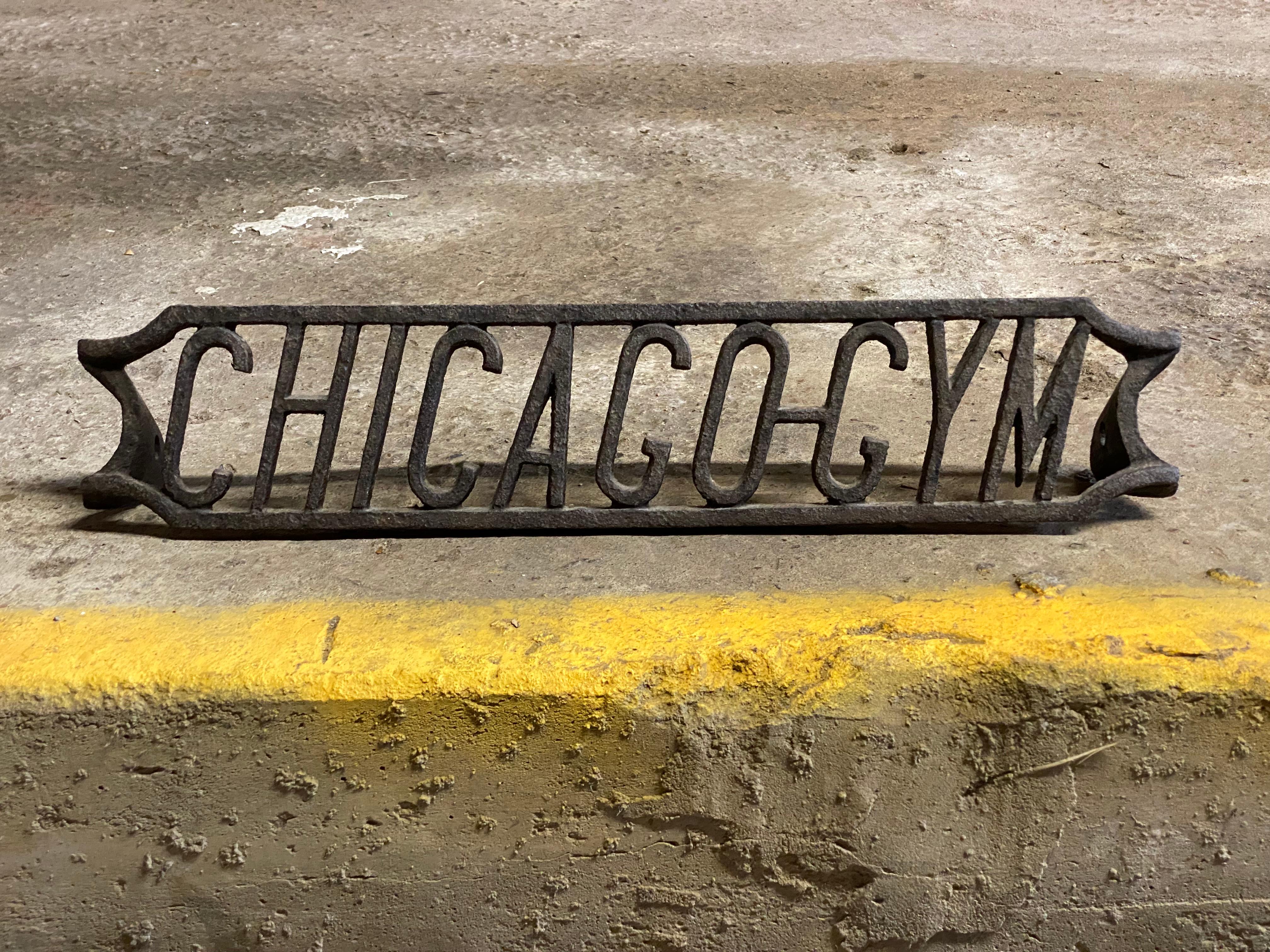 A fine cast iron objet d'art fragment from Chicago Gym. Black iron step or rung from a ladder. Circa 1930-40. Good overall condition. Wear consistent with age and use. Minor roughness.

Measures: Approximately 4