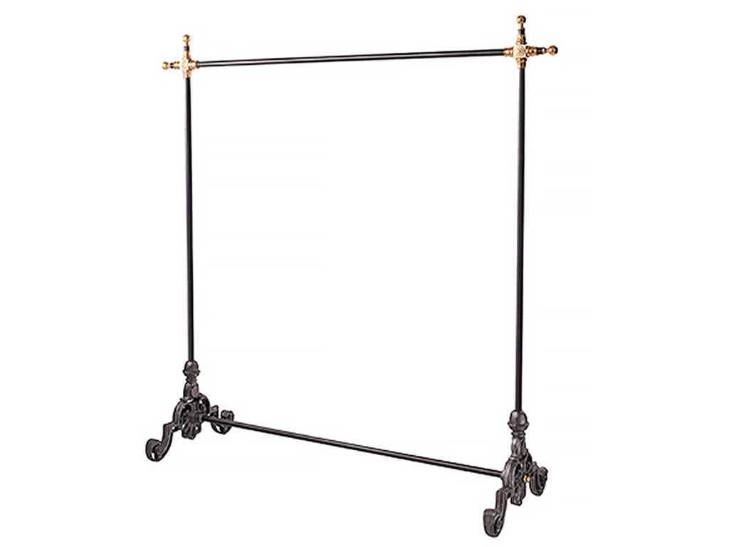 A brass and iron hanger rack inspired by the antique display fixtures found in French boutiques.

Material: brass, cast iron

Made to order (delivery 4 to 6 weeks)

The finish can be changed and the size customised.