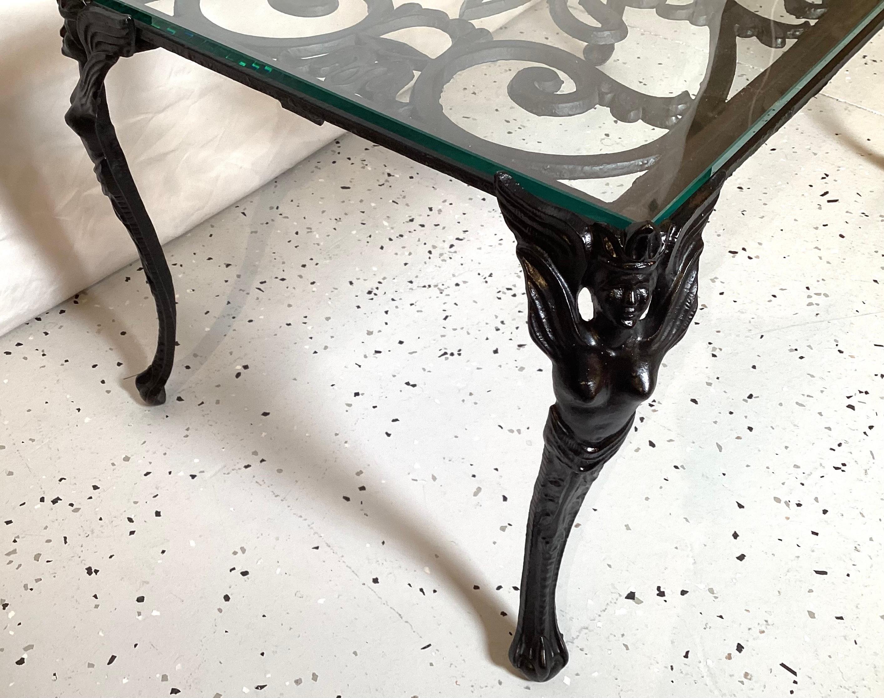 Cast Iron Coffee Table with Glass Top and Winged Woman on Corners In Excellent Condition For Sale In Lambertville, NJ