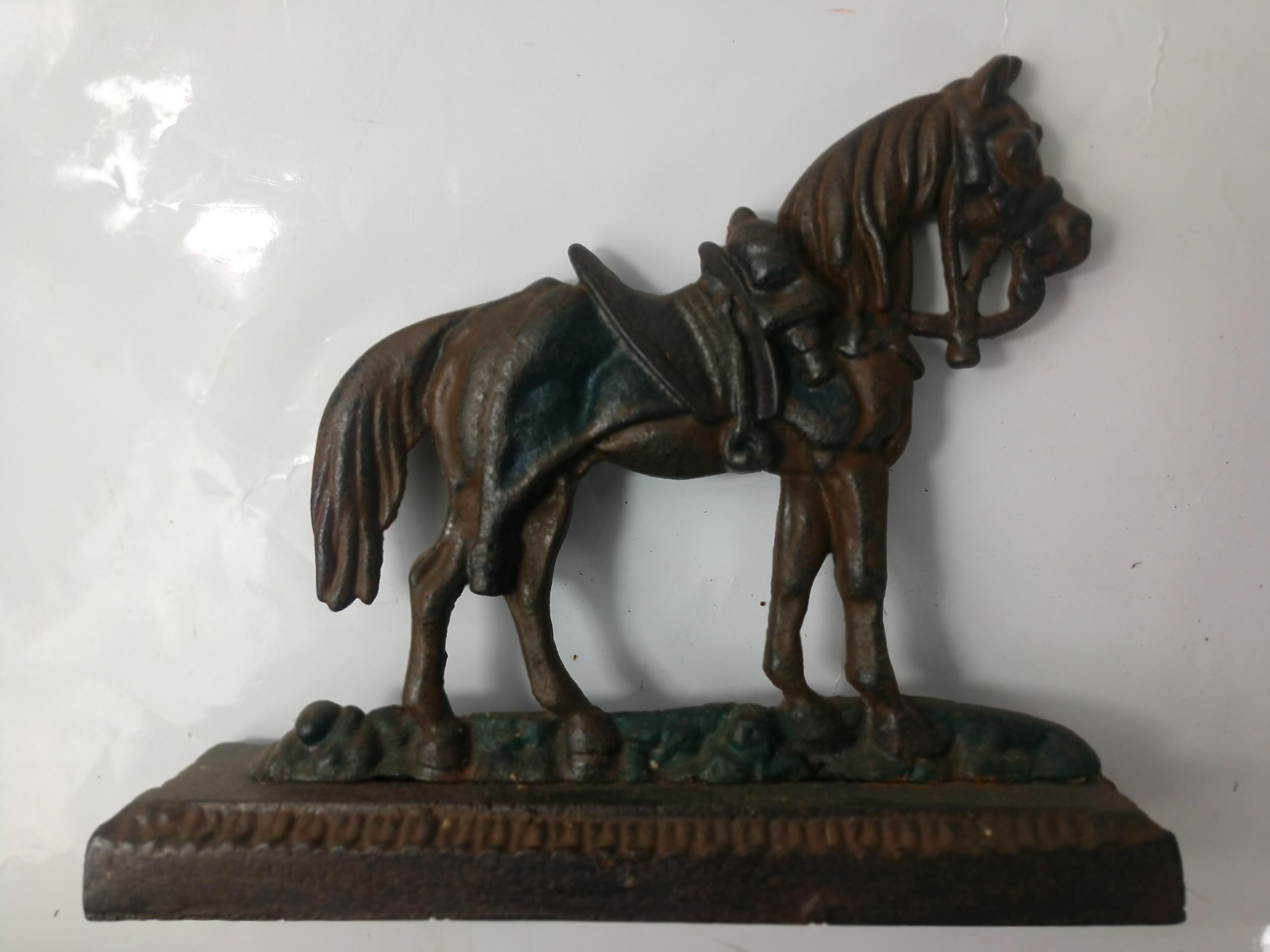 Mid-20th Century Cast Iron Doorstop of a Horse with Full Gear, circa 1940