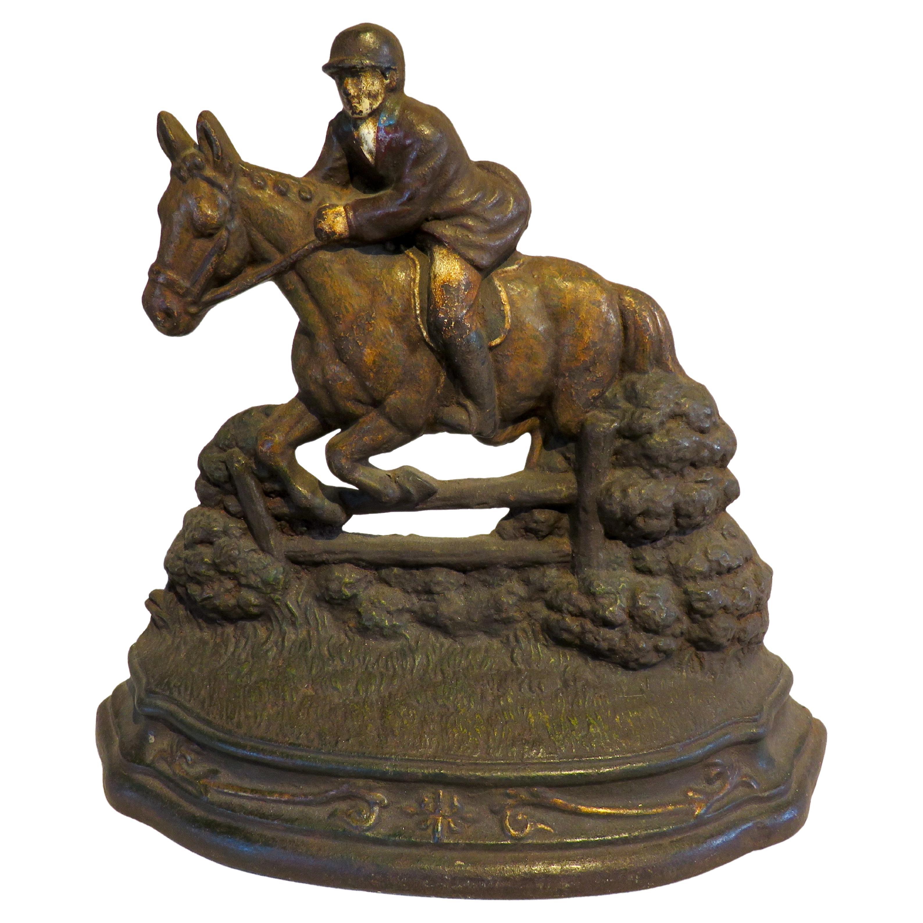 Cast Iron Doorstop with Man Jumping Horse, circa 1895