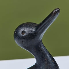 Butée de porte en forme de canard en fonte, fabriquée par Virginia Metalcrafters, vers les années 1970