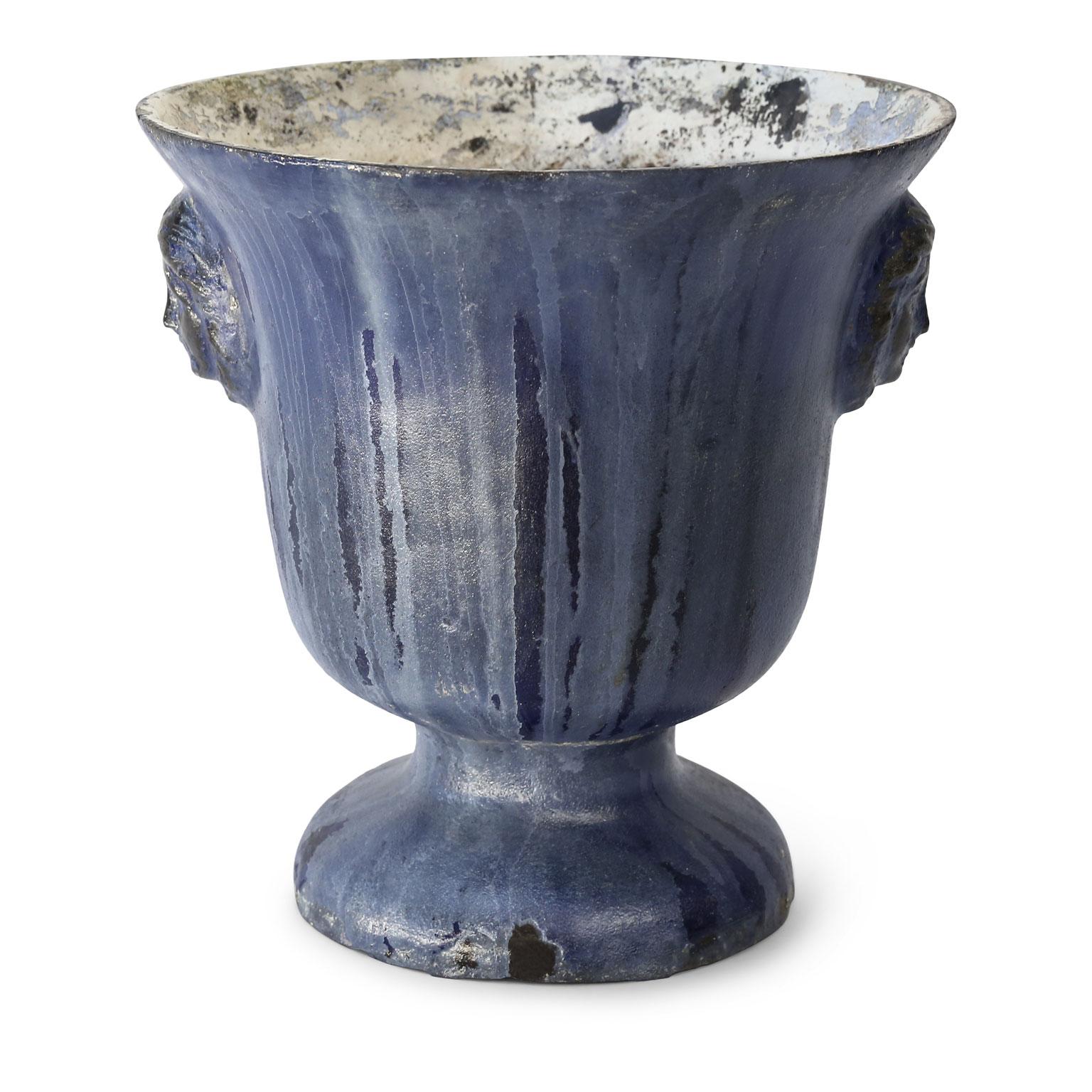 Cast iron enameled Rouen urn with blue enamel finish and distressed patina.