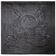 Cast Iron Fireback Decorated with a Warrior Trophy, 18th Century