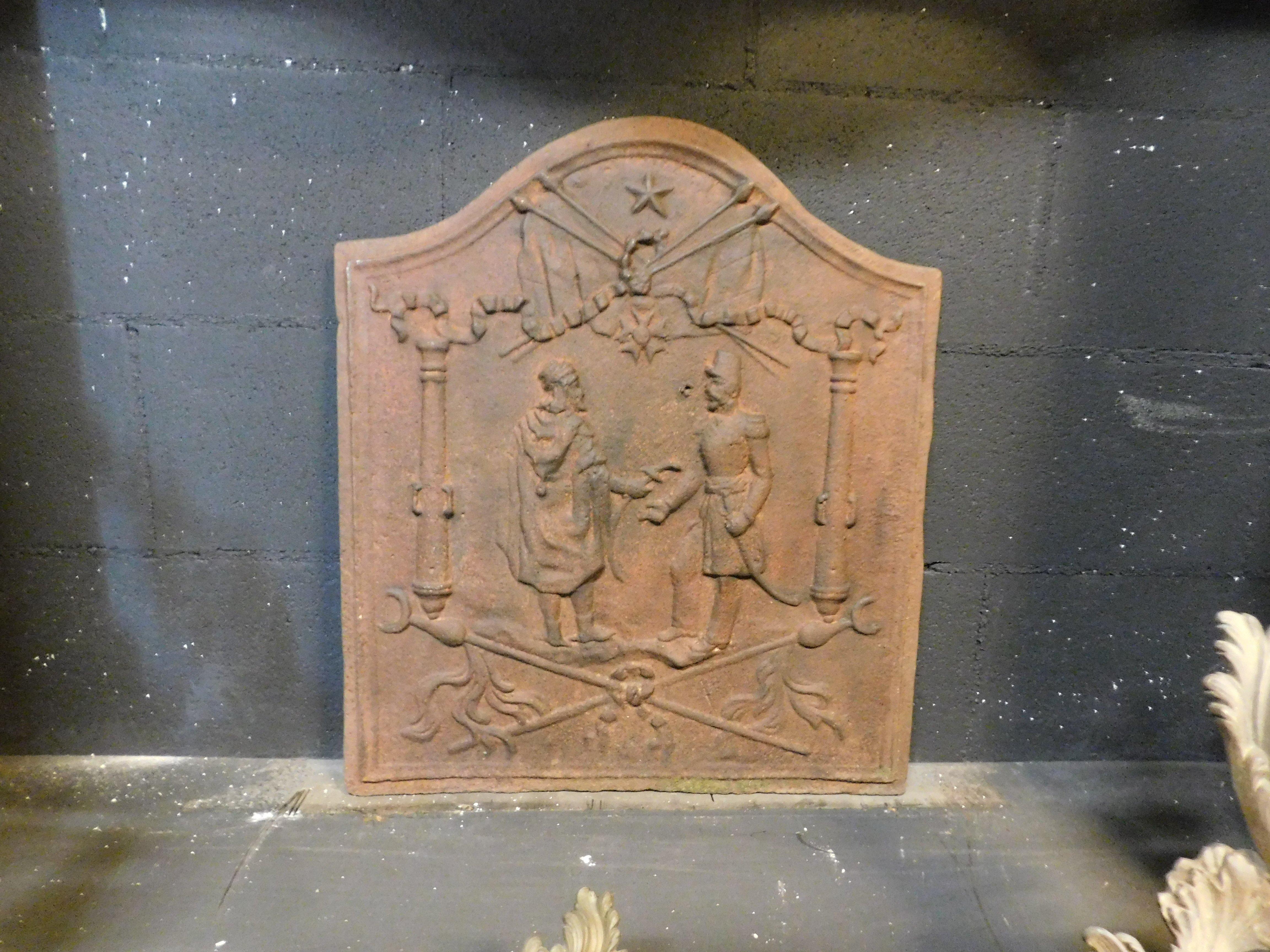 Cast iron fireplace back plate, richly carved with human figures, 19th century, cm L 50 x H 58