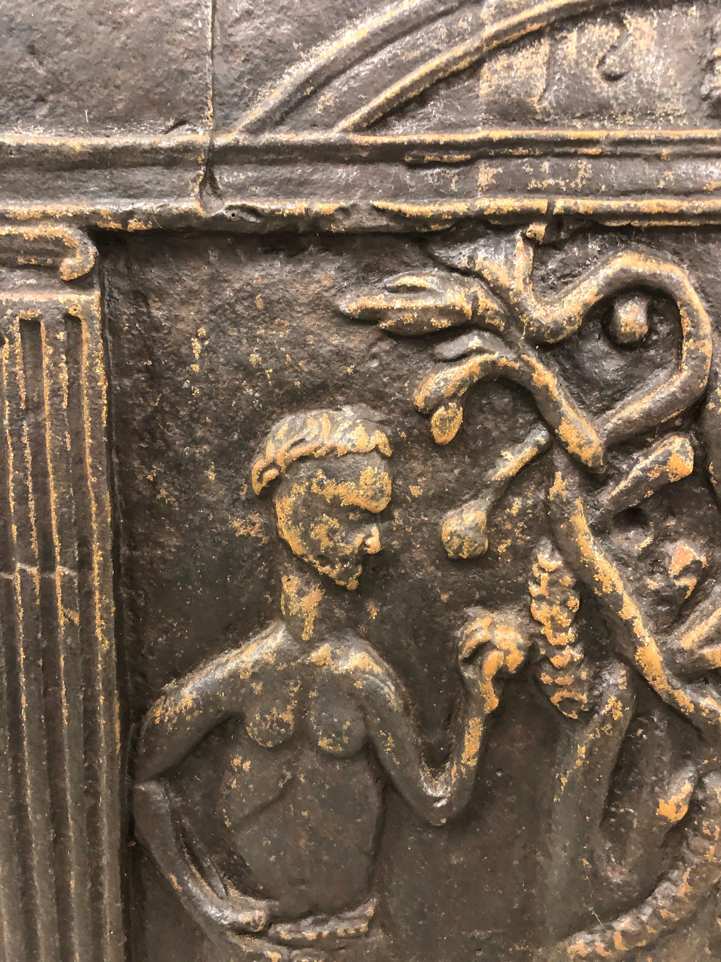 Cast iron fireplace fireback plate. Sculptural depiction of Adam and Eve in Paradise. Most likely Scandinavian origin.

Property from esteemed interior designer Juan Montoya. Juan Montoya is one of the most acclaimed and prolific interior