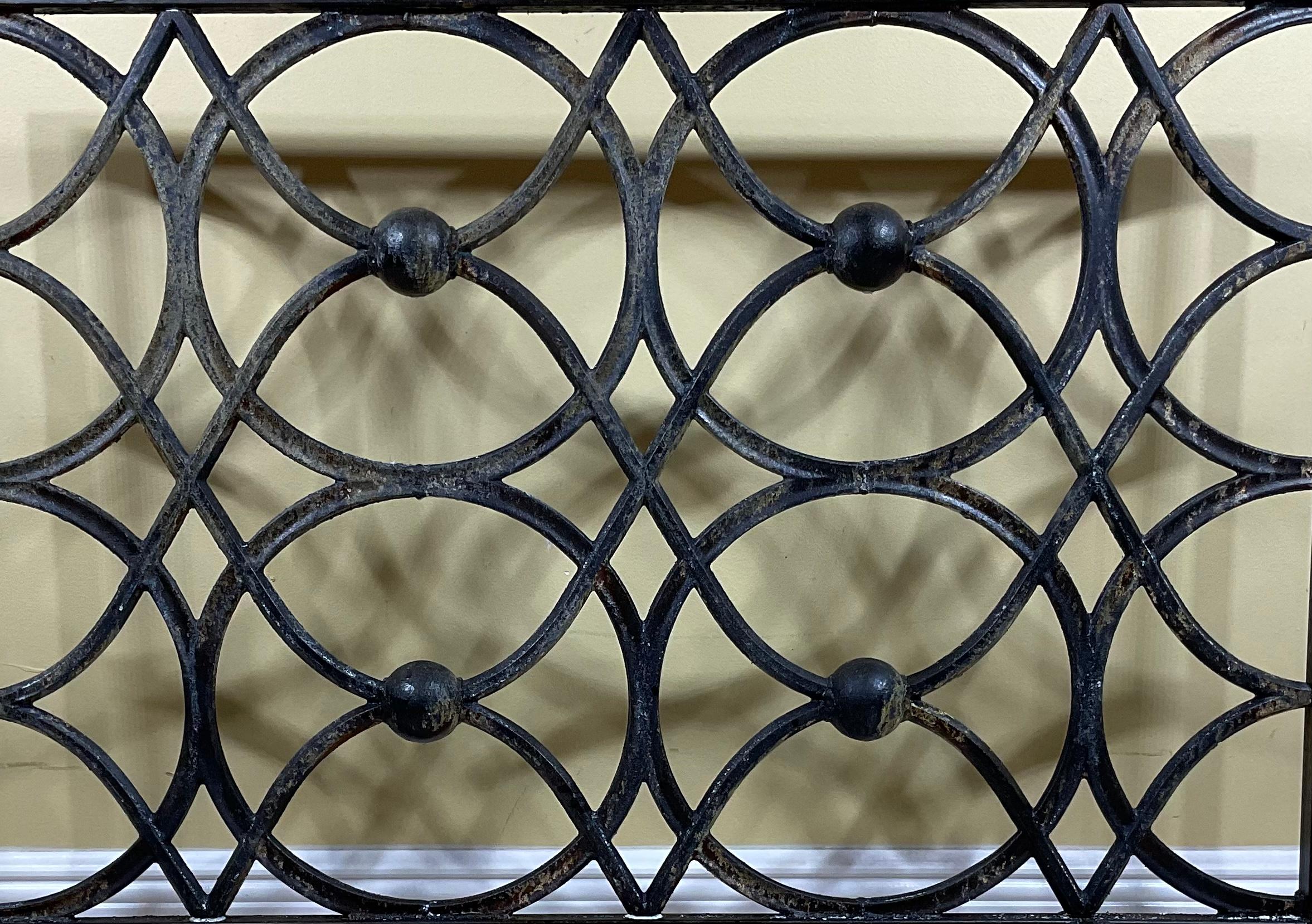 Elegant fireplace screen made of cast iron, artistic circular motif , Treated and sealed for rust.
Beautiful object of art for the fireplace.
