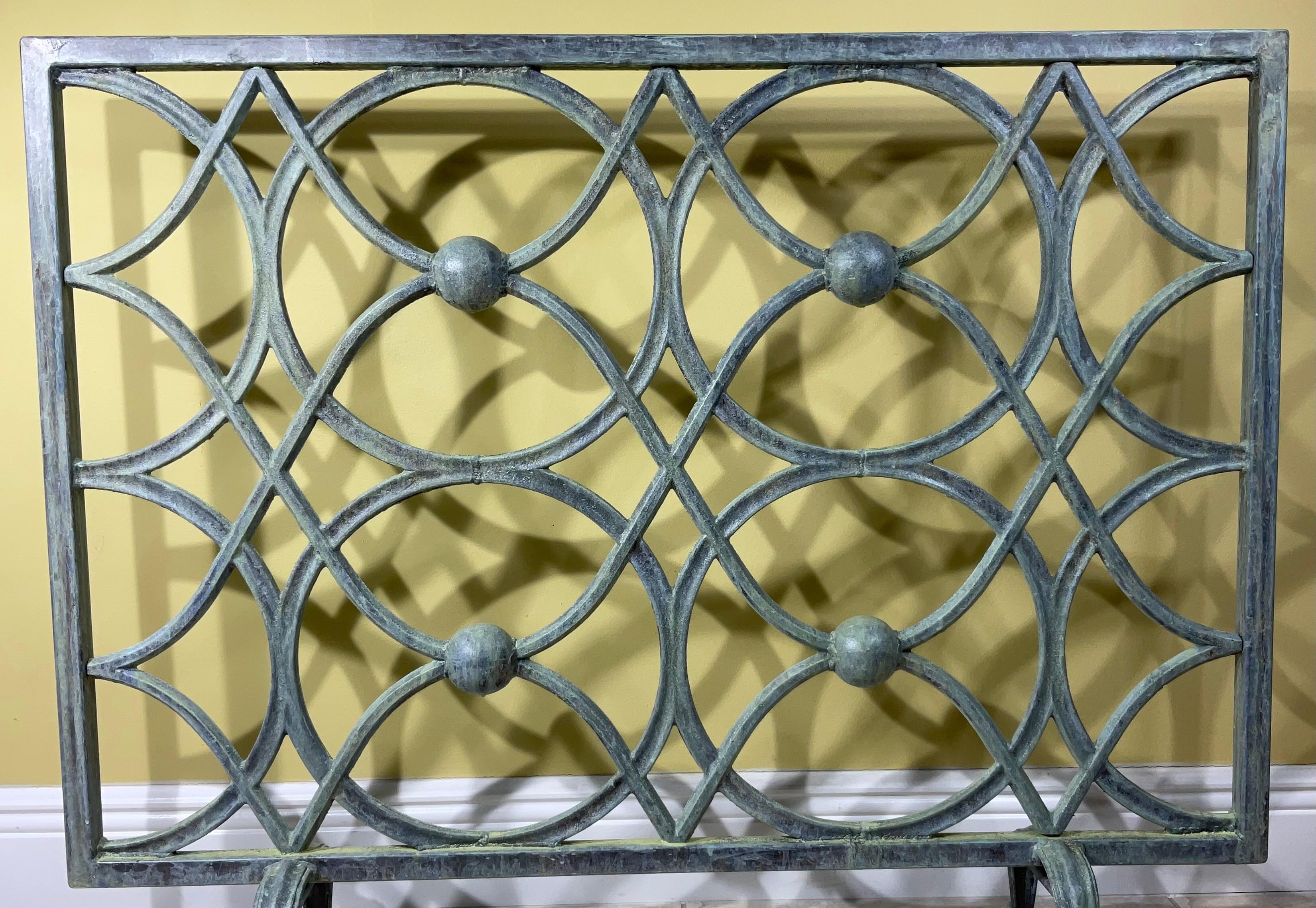 Elegant fireplace screen made of cast iron, artistic circular motif, Treated and sealed for rust.
Beautiful object of art for the fireplace.