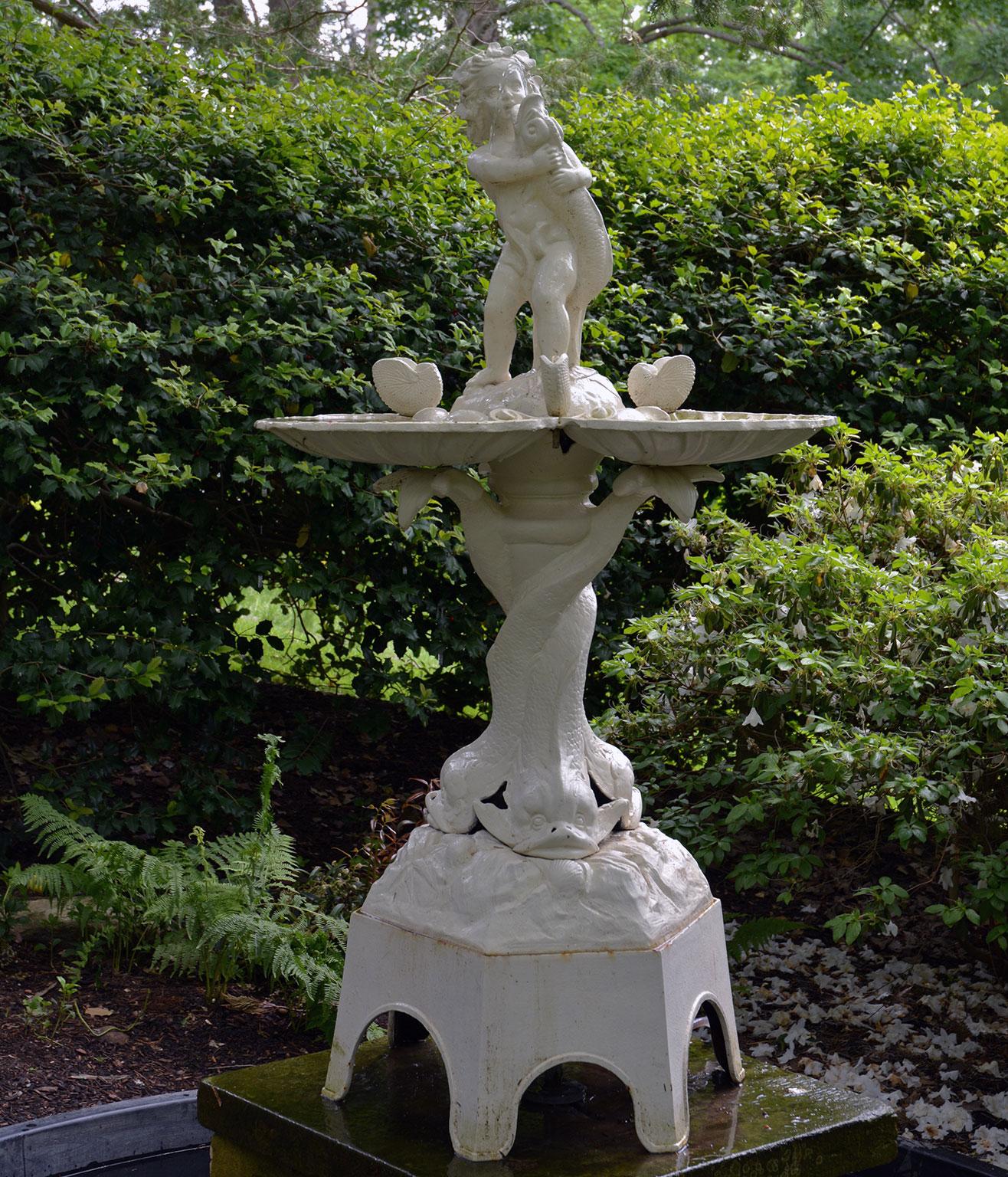 A cast-iron and zinc fountain, manufactured by the J.W. Fiske Iron Works, New York, circa 1910. 62 ins. high, 34 ins. wide, 34 ins. deep. 

This model was offered at least as early as 1868 as it appears in the Fiske catalog in that year. It was