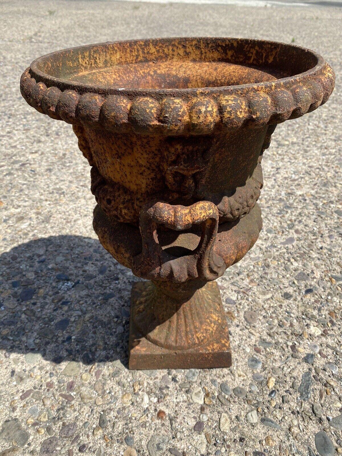 Cast Iron French Classical Style Urn Form Outdoor Garden Planter with Faces In Good Condition In Philadelphia, PA