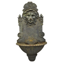 Fontaine d'eau murale en fonte noire à tête de lion pour jardin d'extérieur de style Empire français