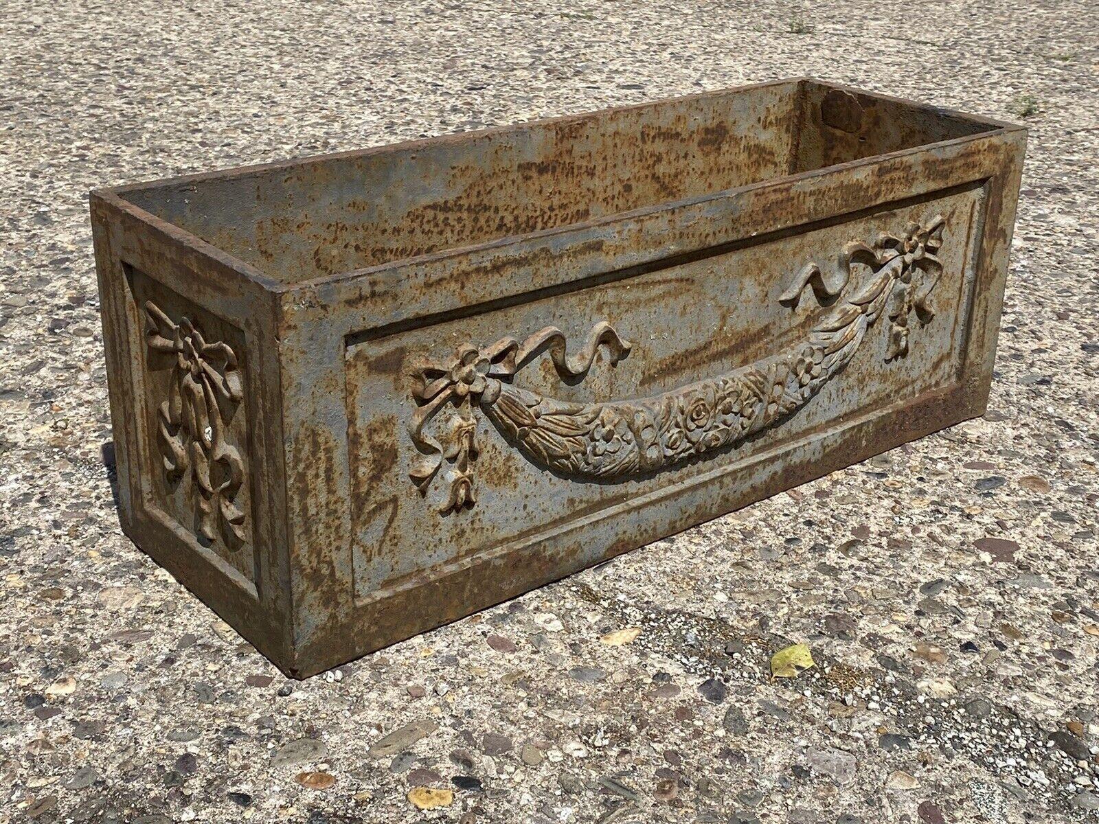 Cast Iron French Louis XV Style Ribbon and Swag Rectangular Outdoor Garden Planter Box. Item features heavy cast iron construction, ribbon and drape swag design, desirable weathered finish, unique rectangular size, great style and form, weighs