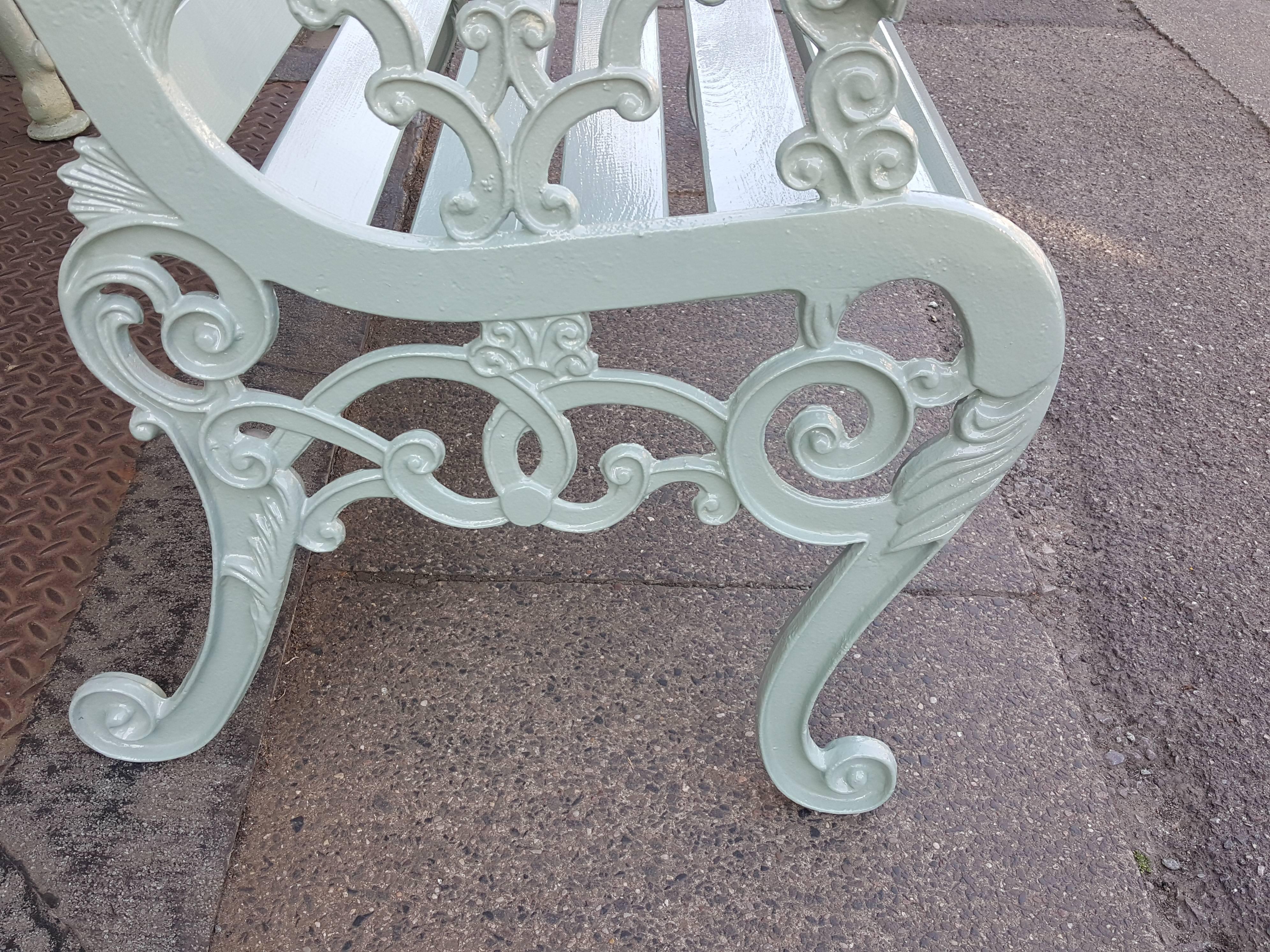Cast iron garden bench with lion head arm rests, fully restored with primed redwood seat.
Measures: 47