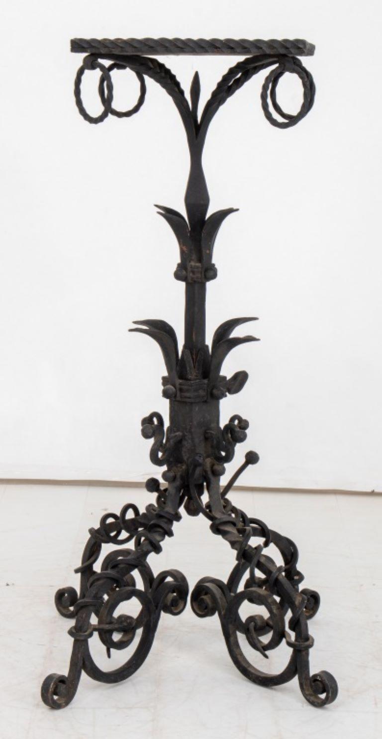 Cast Iron Garden Plant Stand Table, with scrollwork and hanging rings. Provenance: From a Chelsea estate. 