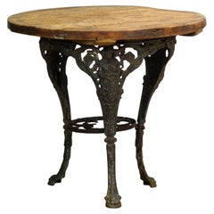 Table de jardin en fonte avec plateau en pin