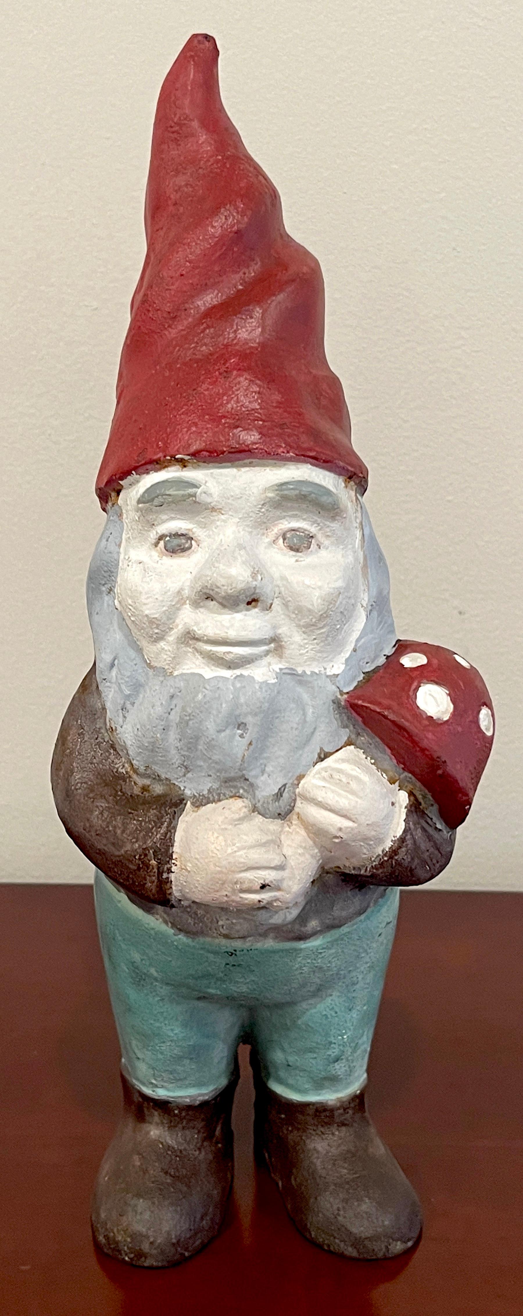 Antique cast iron gnome holding mushroom doorstop/lawn ornament,
Original Paint, USA, Circa 1930s
A great example of American Folk Art, a well painted and taken care of Doorstop/Lawn Ornament This whimsical symbols of good luck, standing tall with