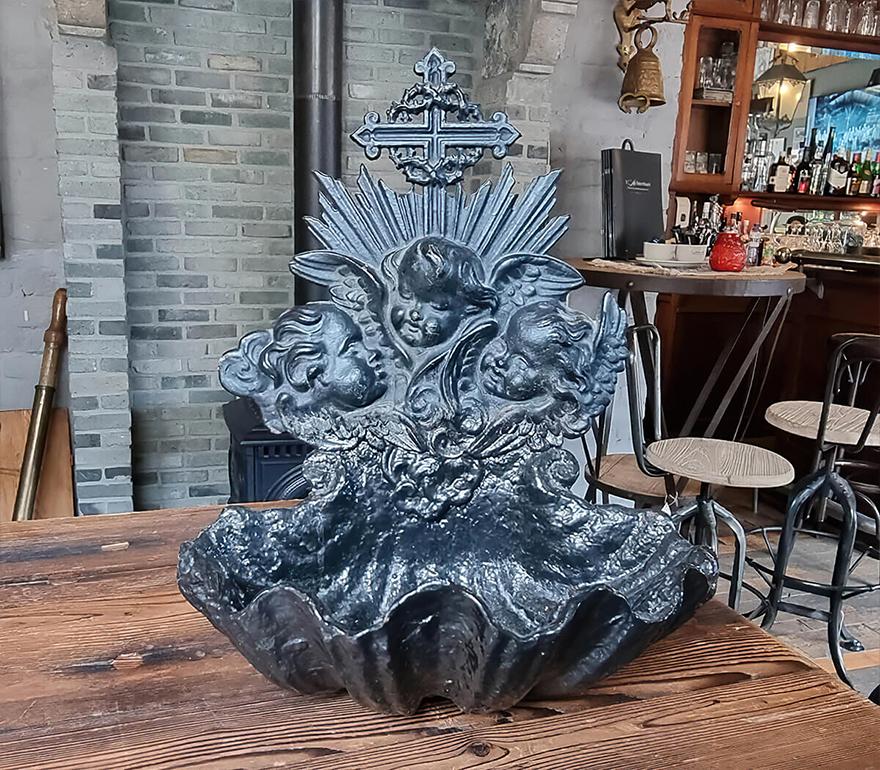 Unique cast iron holy water font from the 19th Century.