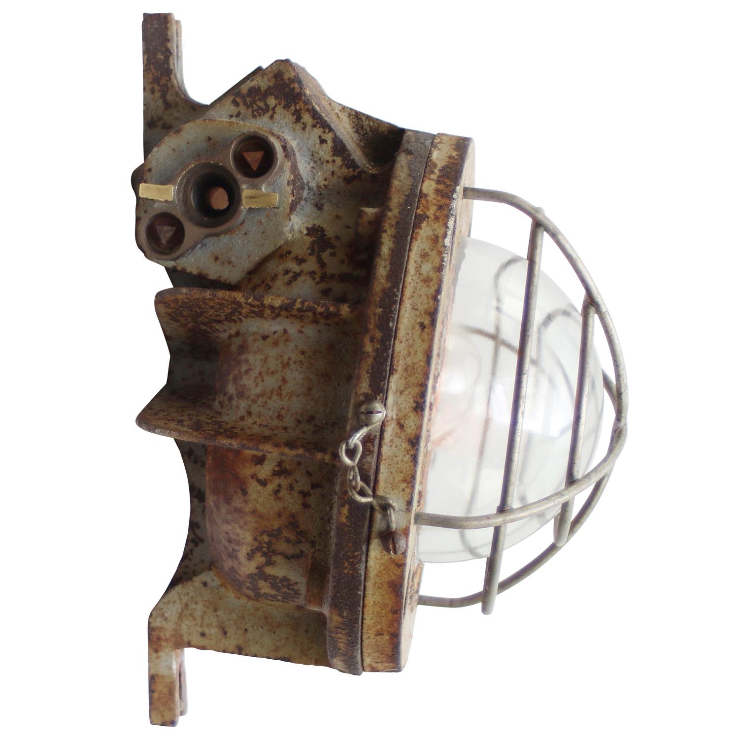 French industrial scone, cast iron wall light by Ch. & G. Grimmeisen, Paris, France
Rust brown cast iron with clear striped glass

Weight: 11.00 kg / 24.3 lb

Priced per individual item. All lamps have been made suitable by international standards