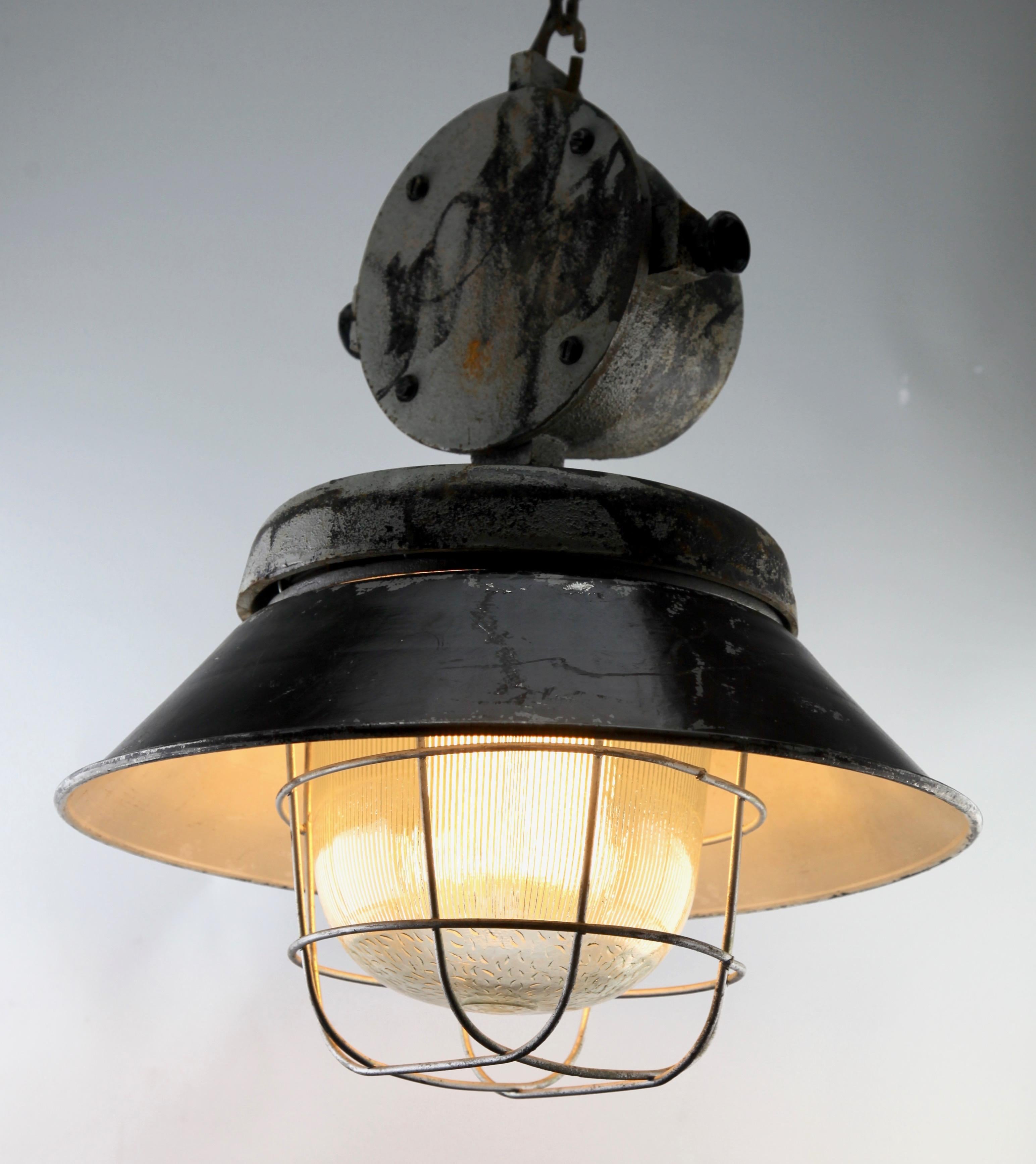 Cast iron large industrial cage pendant lamp, Poland, 1940s

Recently cleaned so that it In clean condition and in full working order having also 
been re-wired and provided with new fittings E27
And safe for immediate usage in the World

Size