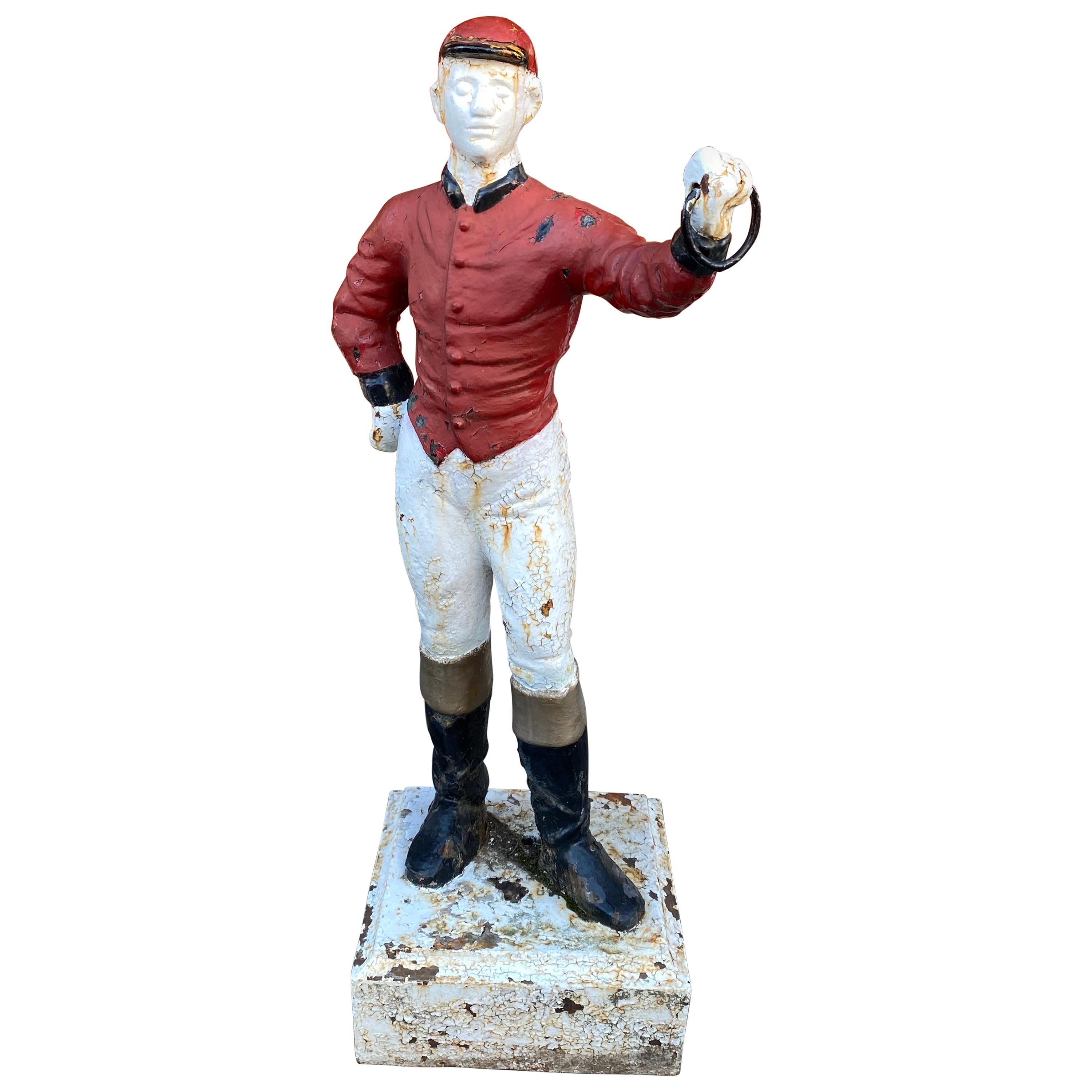 Cast Iron Lawn Jockey from the 1920s, in Red and White Paint