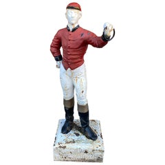 Cast Iron Lawn Jockey from the 1920s, in Red and White Paint